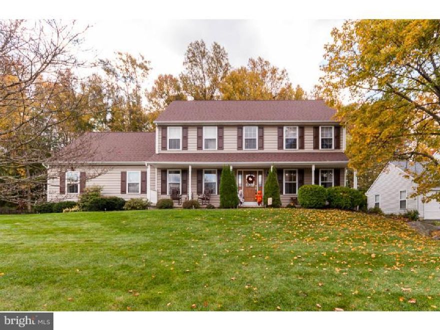 Beautifully maintained and upgraded colonial home nestled on a premium level lot backing to woods at the top of The Woods at Naamans in the Blue Ribbon Garnet Valley School District.  Some of the many wonderful features of this home include a spacious formal living room with cozy electric fireplace, beautiful formal dining room and upgraded gourmet kitchen with center island, granite counters, tile back splash, pendant lighting, and lots of cabinets, spacious first floor laundry/mud room, a cozy family room with hardwood floors and glass sliders leading out to a sun room with a hot tub, as well as a deck that is perfect for enjoying the large private wooded backyard.  The upper level is elegantly appointed with a large master suite complete with an over sized walk in closet and several additional closets for plenty of storage, luxurious en suite bath with vaulted ceilings and skylights, and a separate sitting area large enough to be used as a private office.  Three additional spacious bedrooms and a hall bath complete the second floor. The elegantly finished basement adds additional living space with beautiful hardwoods and built in custom cabinetry, and also features an unfinished area for additional storage.  The large, fenced in backyard is the largest in the community and backs up to mature trees.  This home, one of the largest in the neighborhood, and is a must see.