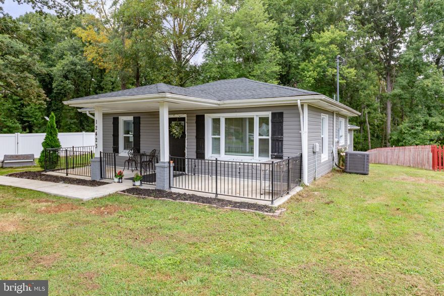 Here is a rare find! Wonderful 1.87 acre parcel conveniently located to Fredericksburg, shopping, and schools.  This home was renovated in 2021, and has a primary suite with adjacent bath and large walk-in closet. Two additional generous sized bedroom and a shared full bath compliment this home. The kitchen boasts granite countertops, stainless appliances, upgraded cabinets, and a large island.   The main home's septic system was replaced in 2019.  Outside, you will find the "Barn", a finished renovated space in 2023 with an open floorplan, full bathroom, kitchen, loft area,  and it's own septic system ( upgraded in 2023) and separately metered. If that's not enough, next too the barn, you will find an RV pad complete with electric, water, and waste hookup.