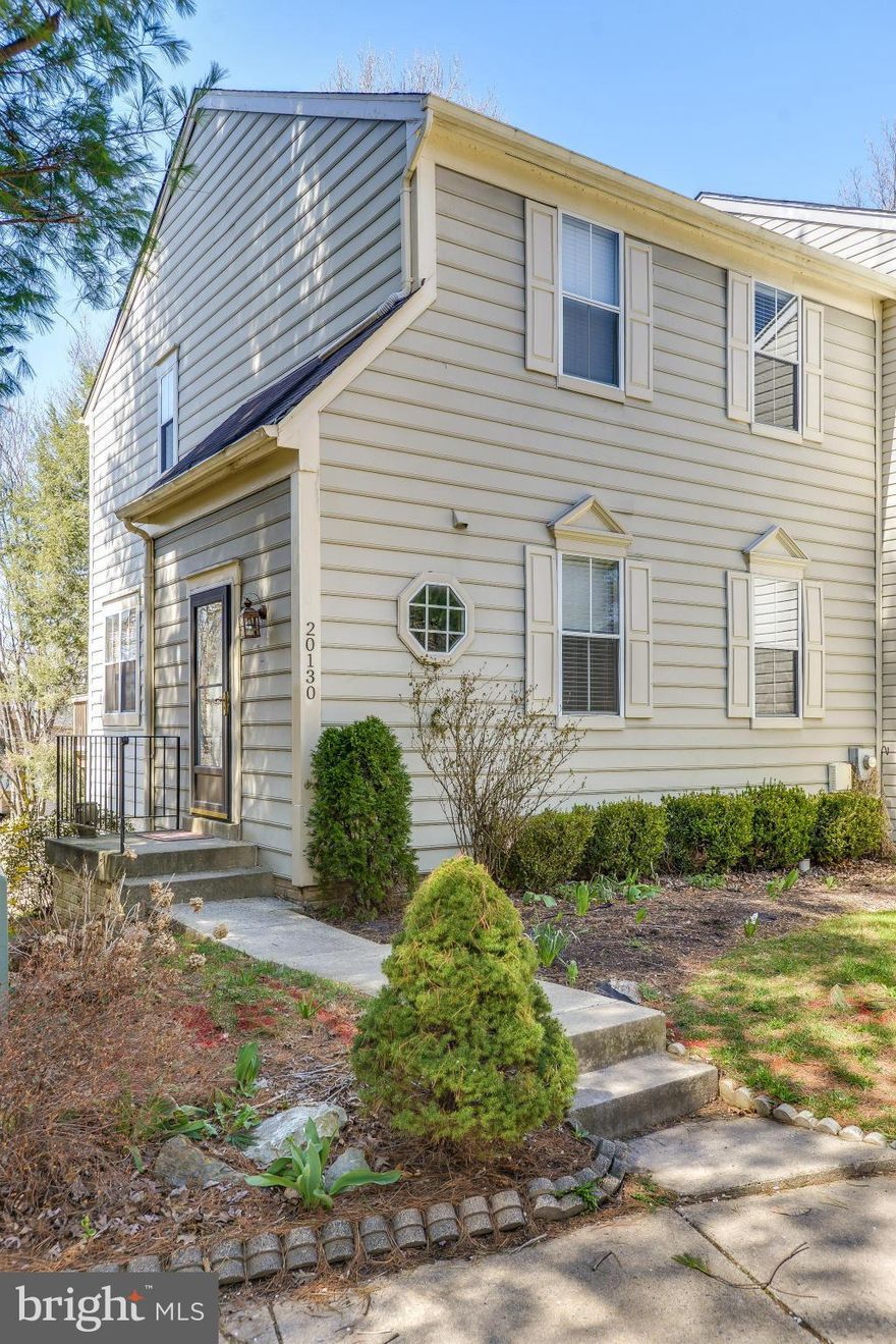 Pristine, open, spacious, light-filled home!  Main level features hardwood floors in living room and dining room.  Kitchen features stainless steel appliances and Corian countertops.  Deck located off of breakfast room.  Upstairs features 3 bedrooms and 2 full baths.  Lower level features large recreation room, full bath, and wood-burning fireplace.  Walk out to fully fenced back yard with patio.