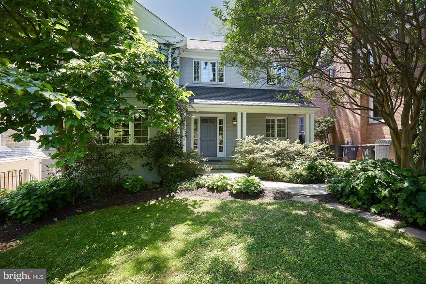 This one is so much bigger than it looks from the front.  Expanded and renovated in the late 1990's with 4272 finished SF above grade and and a total of 5808, most of which is finished; this one has lots of space. Live in it the way it is or renovate the existing space! The ample skylit  kitchen has a ton of counter space and opens to a large table space area with 14' vaulted ceilings and the family room.  The family room has a working fireplace, tons of windows and door out to the deck which overlooks the grassy yard. Additionally, on the main level is a living room, separate dining, an office with adjacent full bath and a powder room, all with hardwood floors.  Upstairs is a sunlit primary bedroom with a beamed ceiling, tons of windows and a huge walk-in closet with two sections.  The primary bath has a separate tub and shower.  Two other bedrooms with en-suite baths and a nice reading nook complete the upstairs.  The lower level features a rec room with an oversized window and door to the yard.  There is a fourth bedroom on this level, a full bath, a wine cellar and a bonus room, so there is lots of flexible space  Additionally,  there is an in-law suite (which the sellers have never used) with a separate entrance.  Two of the fireplaces have never been used by the sellers, a third  has been used frequently and the fourth is not functional.  There is off street parking for several cars  In sought after Wesley Heights, this house is  within walking distance of  neighborhood favorite restaurants, shops, the school and Glover Archbold  Park and others.  A convenient city location.