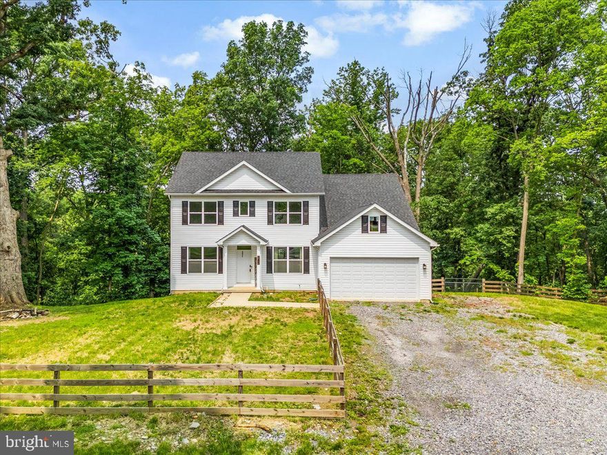 Welcome to your dream home in Avon Bend! Built in 2022, this stunning modern Colonial sits on 2.16 wooded acres at the end of a peaceful cul-de-sac. Thoughtfully designed with an open floor plan, this home offers a perfect blend of style and functionality.

Step inside to find a bright, airy layout featuring a spacious eat-in kitchen with granite countertops, a separate formal dining room, and a cozy sitting room or home office. The inviting living area centers around a beautiful fireplace—ideal for relaxing evenings.

Upstairs, you'll find generous bedrooms and modern finishes throughout, while the full walk-out basement—already roughed in for a full bath—offers endless possibilities for future expansion.

Enjoy the outdoors on the large back deck, overlooking a mostly fenced, wooded backyard perfect for privacy, play, or pets. The attached 2-car garage adds convenience, and the popular Avon Bend community offers river access for even more outdoor enjoyment.

Modern, peaceful, and move-in ready—this is the perfect place to call home.
