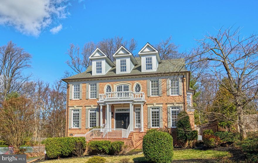 Breathtaking on Bent Twig ! Remarkable custom colonial is majestically sited on an elevated lot in the
Dogwoods, a highly sought neighborhood in the shadow of the Chain Bridge, just one light to DC. Distinguished from outside by its oval spider web windows, stately portico and grand dormer windows, this impressive all brick residence is a study in classic architecture and timeless aesthetic appeal. Inside, prepare to be wowed by the marble foyer, extensive custom millwork, impeccable hardwood floors and four gas fireplaces. The main level library, with painted floor to ceiling paneled walls and built-in cabinetry, holds a special surprise you must see to appreciate. A fabulous kitchen with Crystal cabinetry, and an Owner’s Suite bath with new Quartz countertops, ensure you are enveloped in luxury at every turn. Don’t miss the expansive lower level with wet bar, private bedroom suite and access to the three car garage.  See Documents Section for list of Extraordinary Special Features and 2024 Updates and Floor Plans.