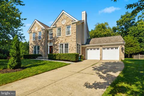 Photo of 20896 Fowlers Mill Circle, ASHBURN, VA 20147 (MLS # VALO2134236)