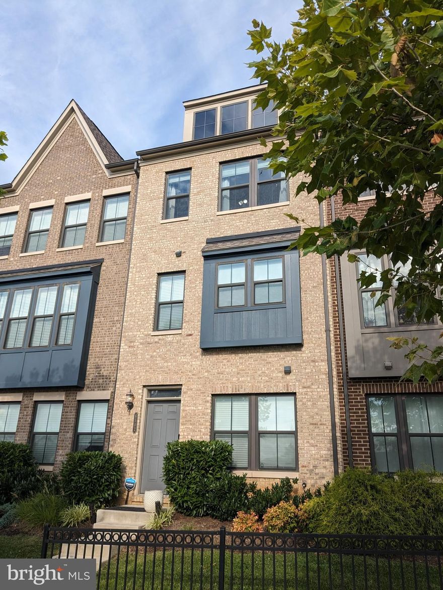 Welcome to your new home! This townhome is nestled in the tight knit community of Riverdale Park Station. Great rental potential close to UMD, trail access to the college, Metro and Marc station.  There is a weekly farmers market at Riverdale Station and at the farmers bureau. Within the secluded neighborhood is a Whole Foods, Golds Gym, Starbucks, Burton's Grill. On the entry level is a rec/flex room with a half bath and access to the one car garage. Leading up to the main living level with an open floor plan kitchen and large bard. Breakfast area and full living room with access to the back deck and a half bath. On the third floor there is an owner's bedroom with a full bath and another large bedroom. To top it all off this home has a loft area that could be used as an office or relaxation area leading onto the roof top deck.