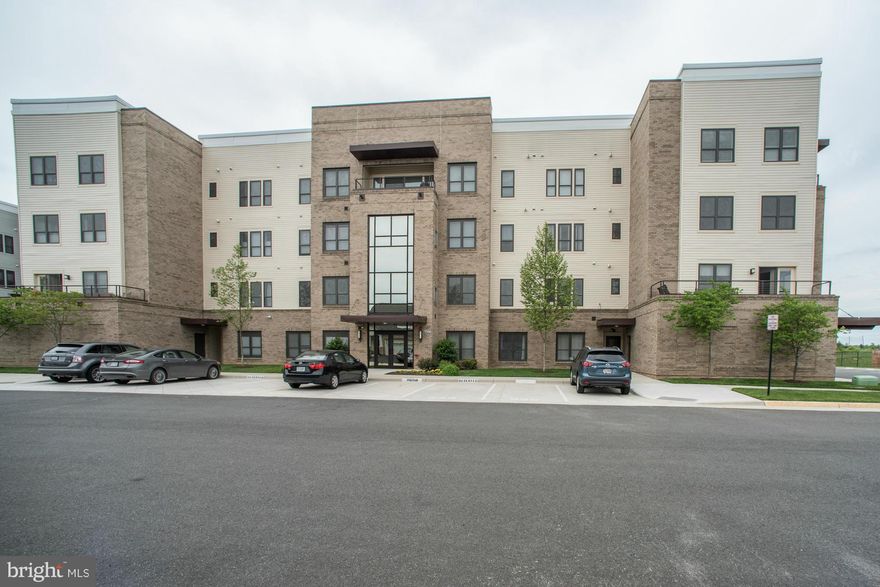 Highly sought after corner unit. Looks over golf course. West & South views. 30K in upgrades. Kit is a chef's delight. 3 French Door frig. gas cooking, Bosch Dishwasher. All Applian. SS, upgraded Cabinets, Granite Counter tops with backsplash. Hrdwd flrs throughout with sound proof cork. Move in condition. Walk in closet with xtra shelves. 2 parking spaces.Active adult 55+ Club house very special.