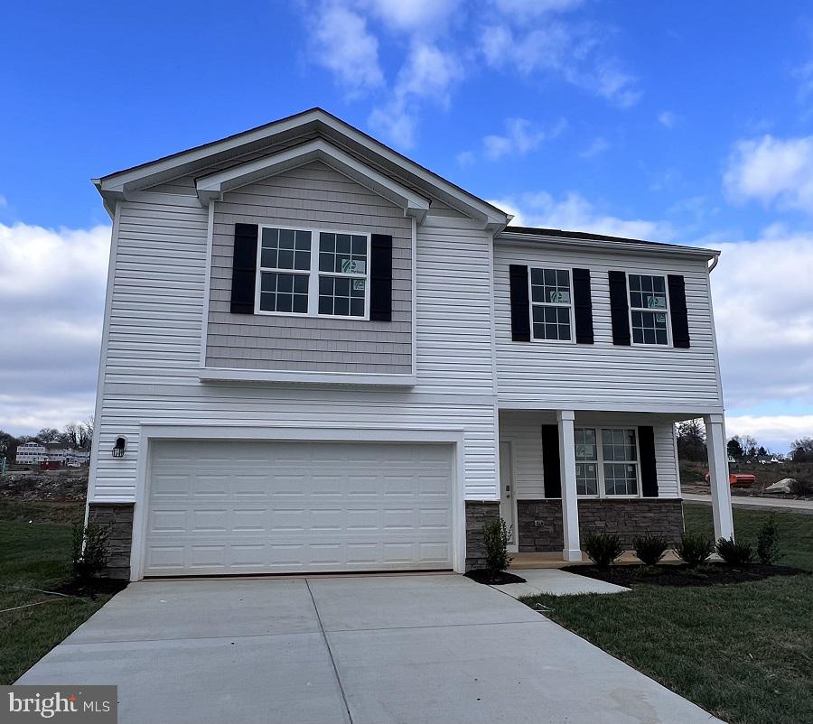 This charming 2-story, 2148 square foot home is designed for both style and functionality. With four bedrooms and 2.5 baths, it provides plenty of space for comfortable living and entertaining. On the main floor, luxurious vinyl plank (LVP) flooring extends through the open living areas blending durability with a modern look. The kitchen is a highlight, featuring sleek quartz countertops and stainless steel appliances that bring a contemporary touch to the space. Ample white cabinetry provides plenty of storage, and the kitchen flows seamlessly into the living area, making it easy to cook, dine and entertain. Upstairs, you'll find all four bedrooms, including a spacious owners suite with an en-suite bathroom. The additional three bedrooms share a second full bathroom, while a convenient half bath is located on the main floor for guests. The new home comes equipped with smart home technology including; video doorbell, smart door lock, smart switch, smart plug, amazon echo pop, smart thermostat and smart panel that connects to your phone making it easier than ever to control your house no matter where you are! Take advantage of incentives and rate options using DHI mortgage, making your new home MORE AFFORDABLE than ever. This home offers a perfect blend of modern amenities, comfortable living spaces, and great upgrades making it a great option for you and your family. Close to shopping, dining, health care and more!