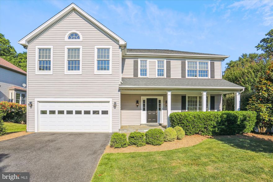 PRICE REDUCED.  Spectacular 6BR/3.5BA colonial with a two-car garage backing to pond in sought-after North Potomac neighborhood of Quince Orchard Estates.  The floor plan boasts over 4,700 square feet of living area on three levels.  Designer-home appeal including a great sense of light and spaciousness with two-story, cathedral, and volume ceilings, oak hardwood flooring throughout the main level, totally renovated kitchen and updated bathrooms, custom painting, elaborate moldings, upgraded lighting fixtures, recessed lighting, and custom window treatments throughout. Relaxing outdoor space featuring a rear screened-in porch and deck with stairs leading to flagstone patio offering bucolic views of the pond and rear yard with professional landscape design including mature and flowering trees. Flagstone walkway to old-fashioned front porch with flagstone floor; foyer entrance with new front door, side transom windows, crown molding, double-door coat closet, and access to attached two-car garage; formal living room with box window bump-out and crown molding; dining room with box window bump out, chandelier, crown molding and chair rail; updated powder room with ceramic tile flooring, new vanity, light and mirror; custom-designed and completely renovated gourmet kitchen with cathedral ceiling, Palladian window, pendant and recessed lighting, custom double-stacked 48-inch cherry cabinetry with self-closing hinges and glass door-fronts, oversized center island with deep plate/appliance drawers and wine rack, granite countertops, stack stoned tile backsplash, GE Profile and Bosch appliances with commercial range hood housed in cabinetry with mantel, pantry cabinet, and French door to deck; family room with recessed lighting, crown molding, chair rail, wood-burning masonry fireplace with stacked stone surround, and double French door access to glorious rear screened-in porch with cathedral ceilings overlooking nature’s paradise; enormous primary bedroom suite with cathedral ceiling, Palladian window, ceiling fan, crown molding, and two walk-in closets; primary bath with ceramic tile flooring, dual vanities with new faucets, soaking tub on tile deck, linen/medicine pantry, separate walk-in shower with tile walls and glass enclosure; four additional generous-sized bedrooms (one with cathedral ceiling) with ceiling fans and ample closets; full bath in hallway with ceramic tile flooring, vanity with new faucet, new vanity light, and tub with ceramic tile wall surround; upstairs laundry closet with Kenmore Elite washer and dryer; walk-out lower level recreation room and game area with Frise carpeting, full custom-crafted wet bar, built-in bookcases, crown molding, tons of recessed lighting, multiple storage/game closets with built-in shelving, storage under stairs, updated full bathroom, sixth bedroom, and double French doors to flagstone patio.  Architectural shingle roof; new electric heat pump (2022); 80-gallon hot water heater (2015); professional landscaping design including mature and flowering cherry trees, crepe myrtles, and magnolias among others.  Friendly North Potomac neighborhood with mature trees, sidewalks, lots of green space area, and center pond.  Only a few blocks away from Quince Orchard Knolls Park which is a 9.6-acre Montgomery County park featuring a playground, lighted tennis courts, and fields for softball and other sports plus a picnic area.  Residents enjoy nearby award-winning schools, Quince Orchard Library, as well as nearby shopping, restaurants, and entertainment venues at Quince Orchard Market Place, The Shops at Potomac Valley, and Kentlands Market Square.
