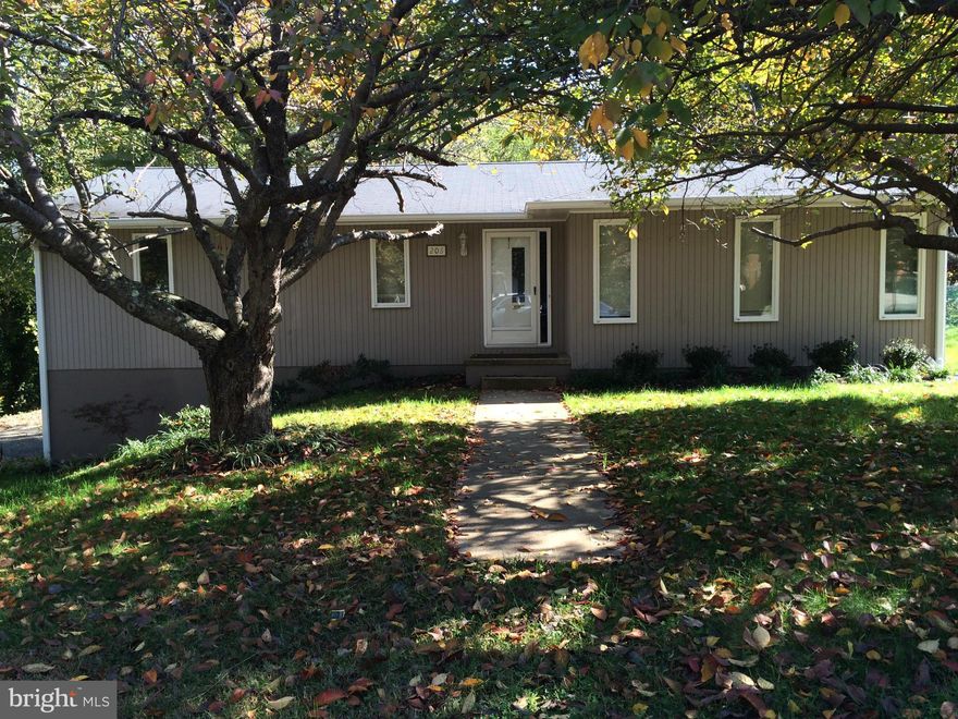 Near downtown Annapolis and Navy stadium . Newly renovated 4 bd 3 full bath with 2 car garage . New kitchen granite counter tops with stainless steel appliances . Full finished basement with in law apt and full kitchen . This home has a large deck that looks onto huge back yard that faces wooded area . There is a private drive way that holds aprox 6 cars. Beautiful built in fireplace .