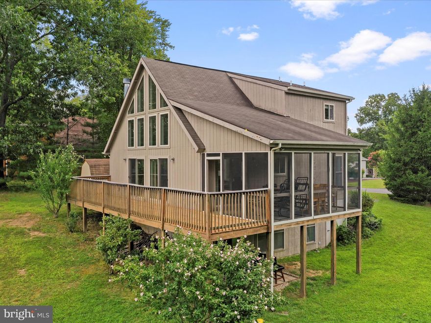 Nestled in the highly desirable community of The Woods in Hedgesville, WV, this charming chalet at 155 Nokomis Trail offers the perfect blend of comfort and natural beauty. Surrounded by mature trees and sitting directly on the golf course, this 4-bedroom, 3-bathroom home features 2,007 square feet of inviting living space. The open-concept design highlights a spacious living area with soaring ceilings, large picture windows overlooking the fairway, and a cozy fireplace for cooler evenings. The kitchen and dining area flow seamlessly together, making it ideal for gathering with friends and family. Step outside to the deck, complete with a screened-in area, where you can relax and enjoy the peaceful surroundings.
Built in 2003 on a private .51-acre lot, this home offers both indoor and outdoor spaces designed for entertaining. The finished basement provides a welcoming retreat with a bar and pool table, making it the perfect place to host guests. Whether you’re looking for a full-time residence, a second home, or an investment property, this chalet in The Woods is a rare find with its combination of wooded privacy, golf course views, and community amenities. Don’t miss the opportunity to enjoy mountain living with modern comfort in this beautiful setting.