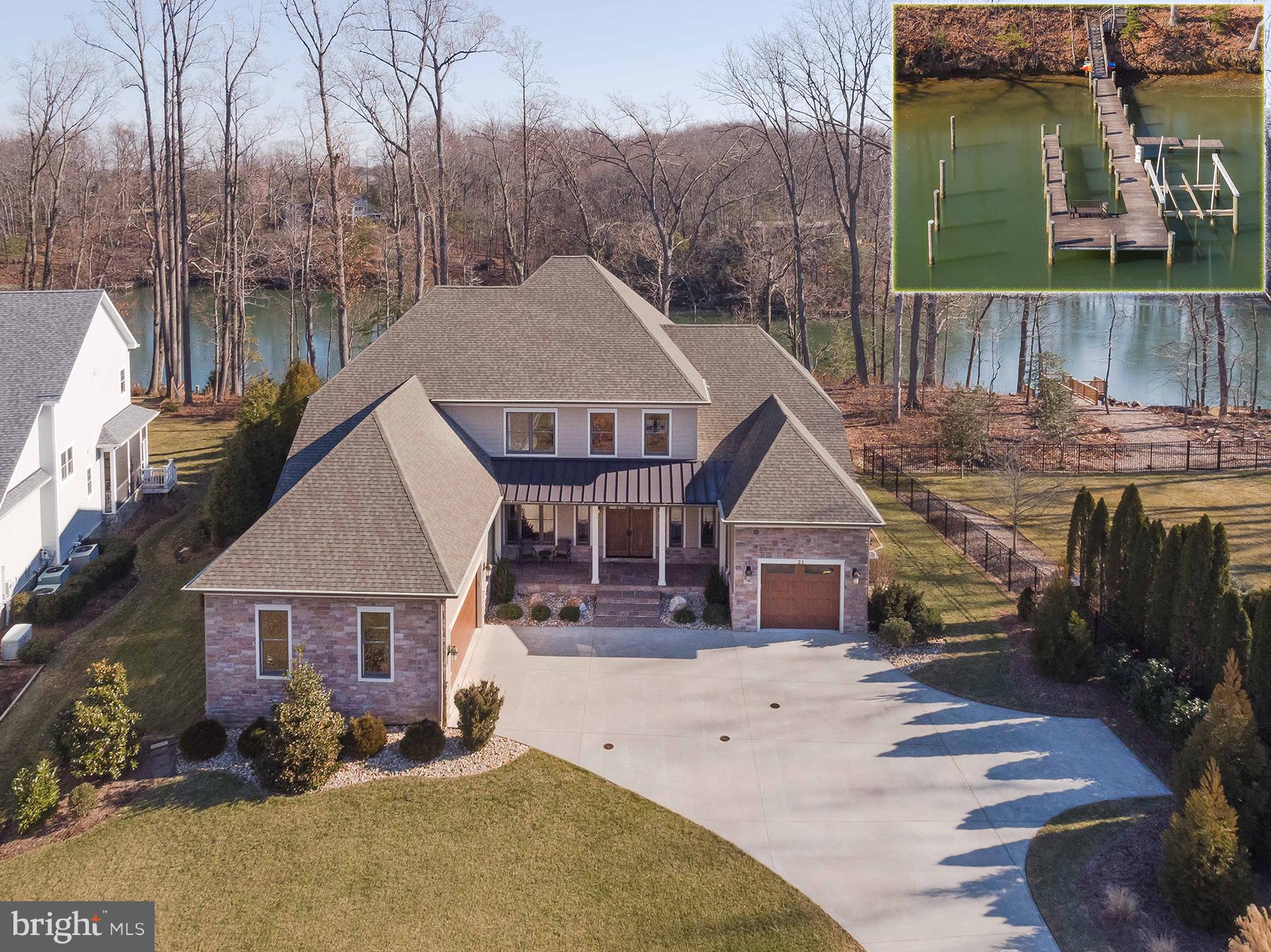 CUSTOM, 4500 SF CHURCH CREEK WATERFRONT. Private deep water pier with boat lift; mins to South River. Walls of windows for huge water views and tons of natural light. 10' ceilings and open floor plan with upper level game room--incredible space for entertaining! Main level master suite. Random width wood floors everywhere. Unfinished walk-out lower level. Waterside patio for outdoor dining.
