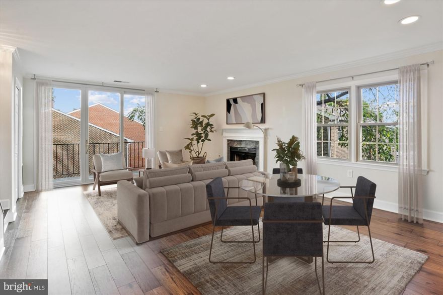 Welcome to 945 South Scott Street, a spacious, sun-filled two-level condo offering nearly 1,200 square feet of fully renovated living in the heart of Arlington. This modern 2 bedroom, 2.5 bathroom residence has been thoughtfully updated from top to bottom, blending stylish finishes with functional design to create the perfect urban retreat.
The main level showcases an open-concept layout and design flooded with natural light. Featuring contemporary LVP flooring, recessed lighting, crown molding, wood burning fireplace and a renovated kitchen with stainless steel appliances, granite countertops and ample cabinetry w/ pass through. A convenient half bath, two large storage closets and an expansive balcony overlooking quiet greenspace complete the main level making it perfect for entertaining or relaxing after a long day.
The upper level offers two generously sized bedrooms and two beautifully renovated full bathrooms. The primary suite features an ensuite bath with dual vanity and spacious closet along with views of the DC skyline and firework viewing. The second bedroom offers flexibility for guests, a home office or even a gym.
Enjoy the convenience of in-unit laundry, assigned parking and low condo fee. Prime location affords easy access to major commuter routes, Metro and public parks—all just blocks away from Arlington’s best restaurants, shopping, and nightlife.
Don’t miss this incredible opportunity to own a turn-key, move-in ready home in one of Northern Virginia’s most desirable locations.
Welcome home!