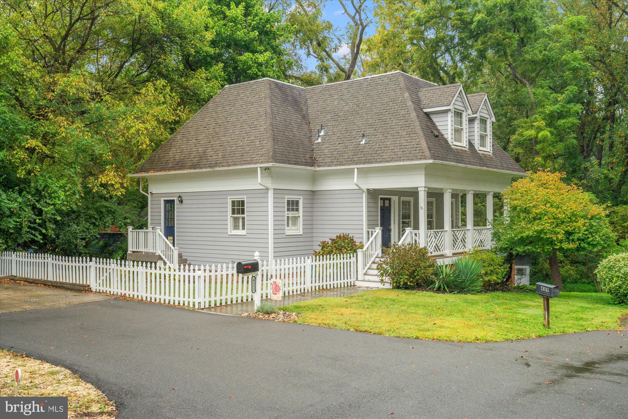 Truly one-of-a-kind, this beautiful 4BR/3.5BA home sits at the end of a quiet cul-de-sac in Chevy Chase, surrounded by natural beauty. Sunlight fills the inviting interior, where spacious living areas, a renovated kitchen, and a spa-like primary bathroom create a warm yet elevated living experience. The home’s character shines through thoughtful details and a layout that blends comfort with style. Outdoor living is equally special, with a charming front porch deck and a rear deck for everyday enjoyment. What makes this property extraordinary is its setting—backing to a park and siding lush green space—offering rare privacy, scenic views, and a peaceful connection to nature. Ideally located just minutes from Chevy Chase Lake, the new Purple Line, Bethesda, and Metro, this move-in ready home combines convenience, charm, and unparalleled location in one truly exceptional package.