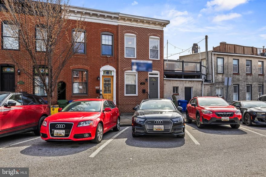 OFFER DEADLINE OF 5PM ON 3/11/24. Welcome to this charming brick-front end-of-group rowhome in the heart of Canton! The main level boasts a welcoming open floor plan, perfect for entertaining, with a large, chef's kitchen showcasing stainless steel appliances and elegant granite counters. Convenience is key with a dedicated laundry room and powder room on the main level. The outdoor patio off of the kitchen is a grill master's dream with ample space for entertaining.  Upstairs, you'll find two spacious bedrooms and a full bath. The second bedroom opens up to a large deck, providing a wonderful outdoor space to relax and enjoy.