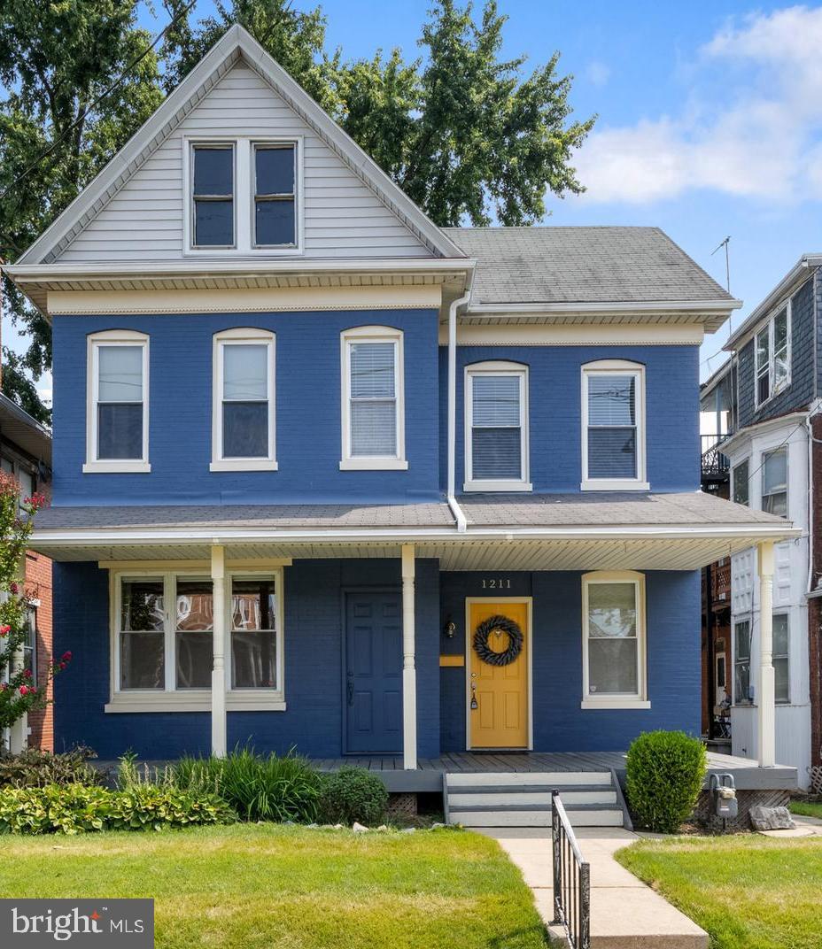 Welcome to this charming two-story Colonial in Central School District, painted a stunning shade of blue with a cheerful yellow door that sets the tone for the warmth and character you’ll find inside. Step into the formal living room and dining room, where ceiling fans add comfort and the deep windowsills bring timeless appeal. The kitchen is a true delight, featuring stainless steel appliances (all included), glass-front cabinets, a double sink, butcher block countertops, brand-new dishwasher, garbage disposal, and recessed lighting. A convenient half bath with a pocket door sits just off the kitchen, and the first-floor bedroom is perfect for guests or a home office which adds flexibility to the floor plan. Upstairs, you’ll find two spacious bedrooms and a beautifully remodeled full bath. The primary bedroom offers walk-up access to the attic and a private balcony is located off the adjacent bedroom. Lots of closets throughout the home provide plenty of storage. Custom trackless blinds add a polished touch throughout. . Additional highlights include a radon mitigation system, washer and dryer, and a screened-in back porch overlooking the fenced yard—ideal for relaxing or entertaining. The one-car garage and off-street parking for several cars make everyday living easy. All of this, just minutes from Route 30 and I-83, making commutes a breeze and conveniences close at hand. With its thoughtful updates, cozy feel, and inviting charm, This home shows true pride of ownership and could be the home you've been waiting for!