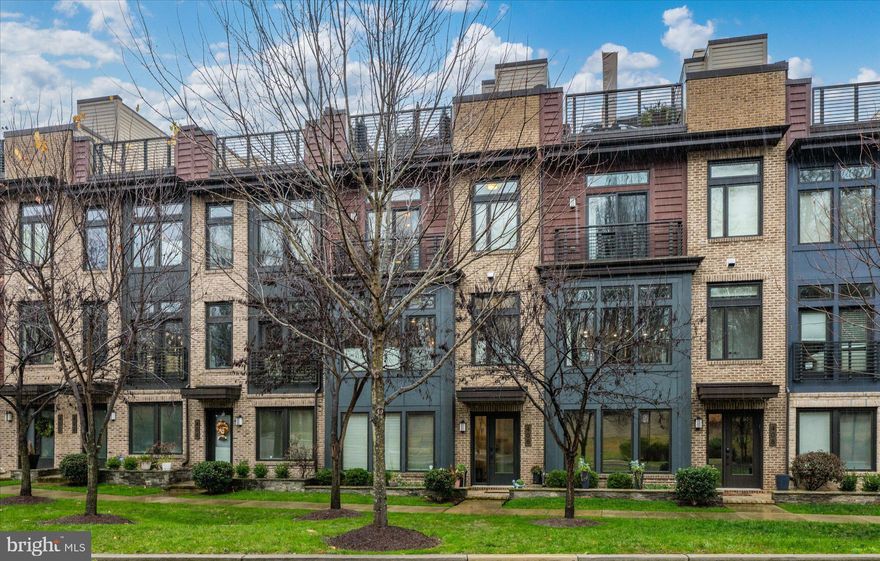 Welcome Home to the whole package!  Barlow Place, built by EYA,  offers not just a beautiful and exquisitely appointed living space across 4 levels with elevator access, it offers one of the best locations in Bethesda with access to everything from everyday conveniences like daily shopping and the Metro at your footsteps, to fine Dining, culture, and quick Beltway access – this is not just a stunning home, it’s an incredible lifestyle.

ENTRY LEVEL FEATURES 
Step right in to a gracious receiving foyer with custom wallpaper, gorgeous Bedroom #4/Office with custom built-in wall cabinet, storage and shelves, mobile-extendable desk with pop-up USB connection, wine fridge, custom barn door on casters, and additional drywall added to expand the space.  The en-suite full Bath makes this a fabulously flexible space, and cleverly conceived, custom-built under-stair storage is designed to perfectly tuck away coats, hats/gloves/scarves, and shoes.  Access to a 2-car rear load garage and a large storage closet. 

MAIN LEVEL FEATURES
Dramatic wallpaper follows you up the stairs into an expansive, open floor plan with high ceilings, LVP flooring, and incredible natural light through floor-to-ceiling windows.  The top-of-the-line Kitchen features white quartz countertops with seating for 3-4 at the large island, white cabinetry to the ceiling, gorgeous, glass tile backsplash to the ceiling, stainless steel appliances, and a walkout to the balcony perfect for grilling. A holiday-dinner-sized Dining area with a stunning light fixture, a large Great Room anchored by a gas fireplace, a charmingly tucked-away bar area that makes this space an entertainer’s dream, and a discreetly tucked-away Powder Room.


UPPER LEVEL ONE FEATURES
Luxuriously appointed Primary Suite with 2 walk-in closets with custom cabinetry, remote controlled window shade, an ensuite Bath with dual vanities, Carrera look tile floor and shower, and a glass shower surround; Bedroom #2 with Murphy desk to maximize space, and generous, custom designed closet; Bedroom #3 with custom designed closest, Full Bath #3 with custom wallpaper, Laundry Room with custom storage cabinets and linen closet.

UPPER LEVEL TWO FEATURES
Like living at a 5-star hotel with rooftop entertainment space!  Dining area, living room with gas fireplace (covered by an automatic retractable awning), an outdoor lounge area, TV hookup, gas grill hookup, an artfully concealed wet bar and beverage fridge, non-slip custom flooring, and unencumbered tree top views, some of the most desirable spots within the community.

OTHER FEATURES
Whole house wired for security including window alarms; HVAC, Fireplace and Elevator services 1-2x per year/bi-annually); your dog’s dream location just steps to Fleming Park, .6 miles to Metro Red Line at Grosvenor; .1 mile to Metro Bus; 1 mile to Wildwood Shopping Center (Balducci’s, Starbucks, CVS, Flower Child, LPQ, Rakugaki, Prima Piatti, Dry Cleaners, boutiques), 2.5 miles to Strathmore Hall.  Walter Johnson HS, North Bethesda MS, and Ashburton ES.