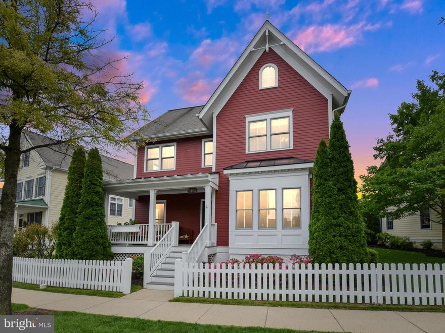 This is your opportunity to own a fantastic neo-traditional home in the Villages of Urbana--complete with a welcoming front porch and a white picket fence! So close to Villages of Urbana amenities: walk to preschool and Blue Ribbon schools! Near Centerville Elementary, Urbana Middle & Urbana High Schools.  Loads of amenities! Playground & the resort-style swimming pool and work out facility are an easy stroll away! Loads of upgrades including hardwoods, two entry closets, gourmet kitchen with granite & Stainless Steel appliances large eat-in  morning room!  The light-filled family room boasts a huge fireplace. Finished basement with media area, full bath, extra storage and bonus room--perfect for guest room or crafts. The upper level is complete with a luxurious upgradedMaster bedroom suite with spa bath: granite, dual sinks, upgraded lighting. Plus 3 more well-sized bedrooms and full bath. Lovely landscaped backyard with patio and hard-to-find extra parking spaces in the rear alley. Don't miss this great opportunity!