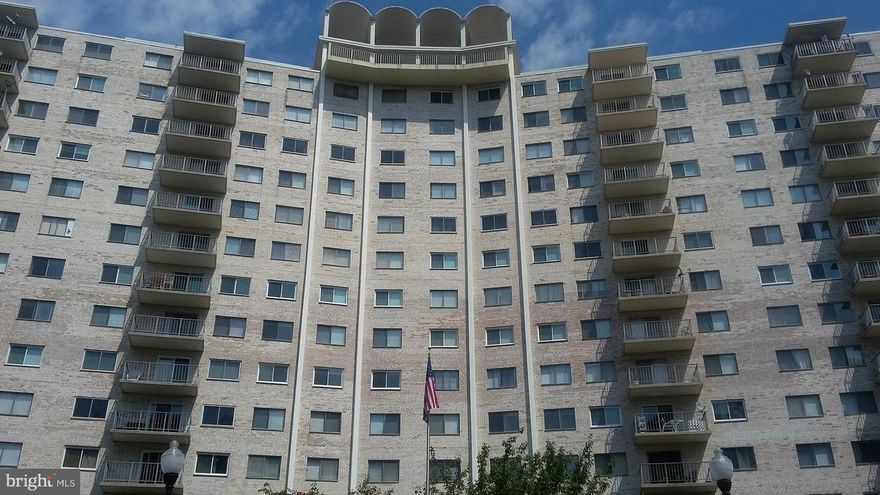 Extremely well priced!!  Spacious 2bed/2bath, wood floors, balcony, huge living room, walk-in closet with balcony in a well managed university tower condominium with pool, tennis ct, concierge and laundry room close to shops, major rds and metro in move-in condition.