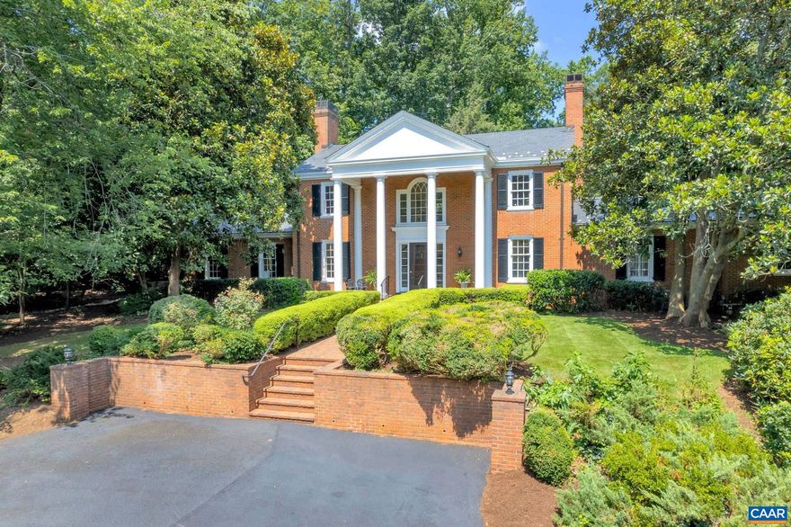 NEW PRICE! Classic 2-story brick home with slate roof and stately front porch boasts a commanding presence on Oak Circle in Albemarle County?s premier neighborhood, Farmington. The home is sited among towering magnolias, mature boxwoods, wandering paths, brick & slate walkways, colorful gardens and backyard Pool. Built in 1955, this custom designed/built one-owner home features traditional details, three wood-burning fireplaces, casual and formal living areas, sunroom, finished basement and hardwood floors. The main house offers 4 BRs + 4 full baths on 3 floors, plus attached, side entry 2-car Garage offers a charming guest suite above with private entrance, living area, kitchen, laundry, BR + full bath. Private nearly level backyard awaits your creativity: main house expansion, detached guest cottage, sport field, or private garden. Access the home from the front circular driveway or the secondary driveway which runs the perimeter of the 1.6 acre lot, allowing easy access by car, bike or golf cart. Savor the privacy of 440 Oak Circle while enjoying close proximity to Farmington?s sport courts, fitness center, delicious dining, Clubhouse activities, premier Golf and mountain views from the North Lawn.  Unique opportunity!,Fireplace in Basement,Fireplace in Family Room,Fireplace in Living Room