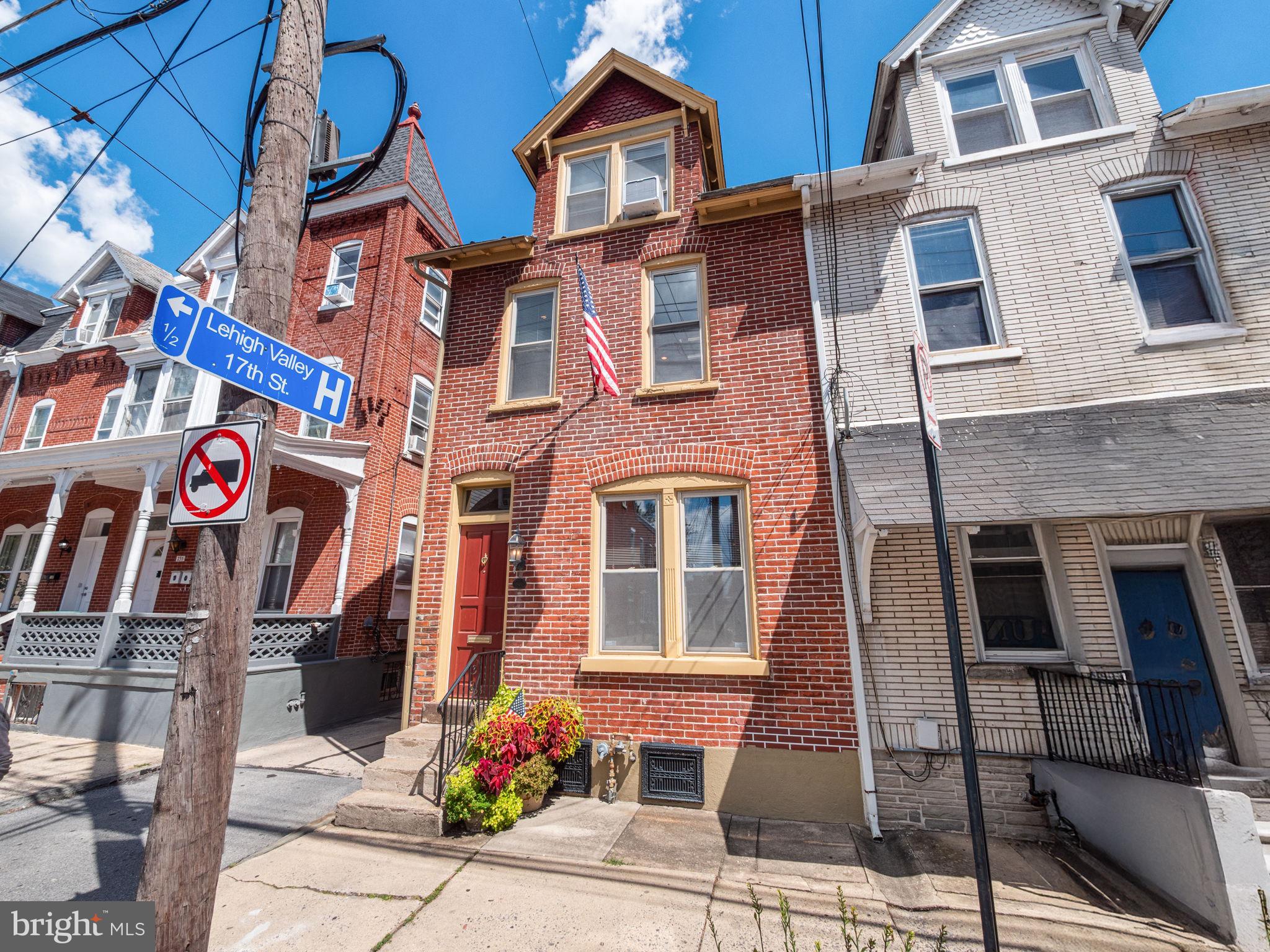 SHOWINGS START 5PM SEPTEMBER 5TH. Must-see, one of a kind townhouse located in the Old Allentown Historic District. Upon passing through the foyer, you instantly notice the unique layout of curved walls and custom cherry woodwork throughout the 1st and 2nd floors. The abundance of natural light from the 3rd floor skylights, oversized windows combined with 12’ ceilings on the 1st floor and hardwood floors give a spacious feel to the living room and dining area. The kitchen design and cabinetry are sleek and functional. A brand-new dishwasher was recently installed. The laundry room and half bathroom round out the 1st floor. The second floor features the primary bedroom with high ceilings and skylight, 2nd bedroom and the full bathroom. The large bathtub and shower are tiled with beautiful imported Italian tile. Separate dressing area off the bathroom which connects to the 2nd bedroom. Taking the spiral staircase up to 3rd bedroom/loft, you will find another custom space. The large built-in oak desk is perfect for a home office, and the large skylights light up the space naturally. The bi-level den with its beautiful stonework and wine cellar is a spectacular space, perfect for entertaining. Lastly, step outside to your very own secret garden in the city. The fenced in brick courtyard and upper-level deck brings a sense of peacefulness with mature shade trees, perennial garden and water feature. Newer on demand hot water heater and gas furnace. Two brand new a/c units have recently been installed