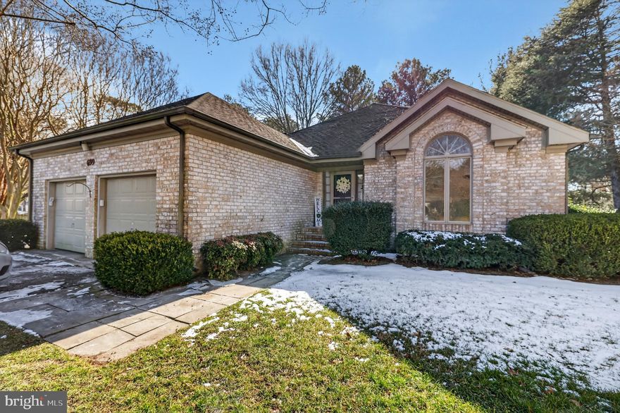 This well-kept all-brick home offers a great floor plan that flows comfortably from room to room, making everyday living easy and enjoyable. New flooring in the foyer and kitchen gives the space a fresh, updated feel, complemented by upgraded granite countertops and a stylish backsplash.
The living room is a true highlight—vaulted ceilings, skylights, and abundant natural light create an inviting, airy atmosphere. A fireplace adds warmth and charm, making it perfect for relaxing or entertaining.

The kitchen features stainless steel appliances and ample workspace, ideal for daily meals or hosting. The primary suite includes a walk-in closet and a large bathroom with tile flooring, a double vanity, oversized mirror, jetted tub, separate walk-in shower, and a skylight for natural light. Enjoy a private paved patio, perfect for morning coffee or evening relaxation. Conveniently located near the Salisbury Zoo, shopping, Ocean City beaches, and major routes for easy commuting and weekend fun.