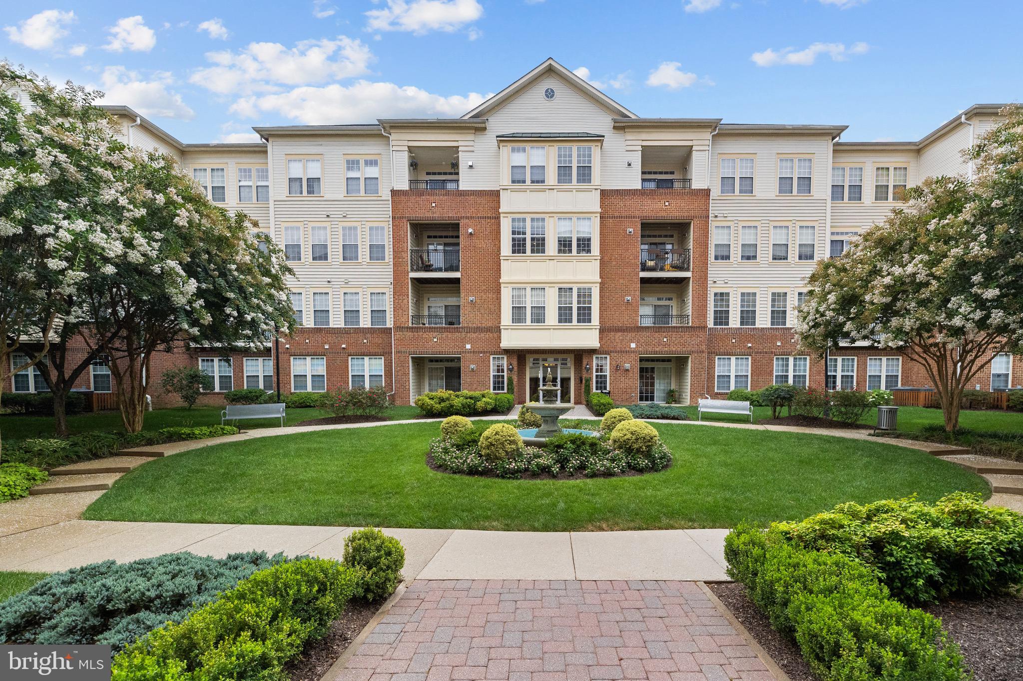 Welcome to 2540 Kensington Gardens, #204, a light-Filled, stylish and newly refreshed 3 bedroom / 2 bath condo at the Enclave at Ellicott Hills - a 55+ amenity rich community! Step into this beautifully updated home, where natural light and plenty of space create a warm, inviting atmosphere. This home is ready for you to move in and start enjoying a carefree, low-maintenance lifestyle, with an abundance of community activities. Thoughtfully laid out with 3 bedrooms and 2 full baths, this home features a spacious living room that opens directly onto a private balcony—ideal for savoring your morning coffee or unwinding in the evening. The formal dining room, offers the perfect setting for gathering family & friends for meals. The home also includes a well-appointed kitchen, with all new stainless steel appliances. The generous primary suite boasts a walk-in closet, along with a private ensuite bath with dual vanities. Two comfortable guest bedrooms and a second full bath ensure privacy and flexibility for visitors. Full-sized washer and dryer add modern convenience! Enjoy the beautifully maintained community grounds, which include a peaceful courtyard, elegant lobby, and an impressive clubhouse featuring a fitness center, library, game room, social areas, swimming pool, tennis courts, and more. Let go of the stress of home maintenance and embrace the comfort, connection, and ease you deserve. Welcome Home!
