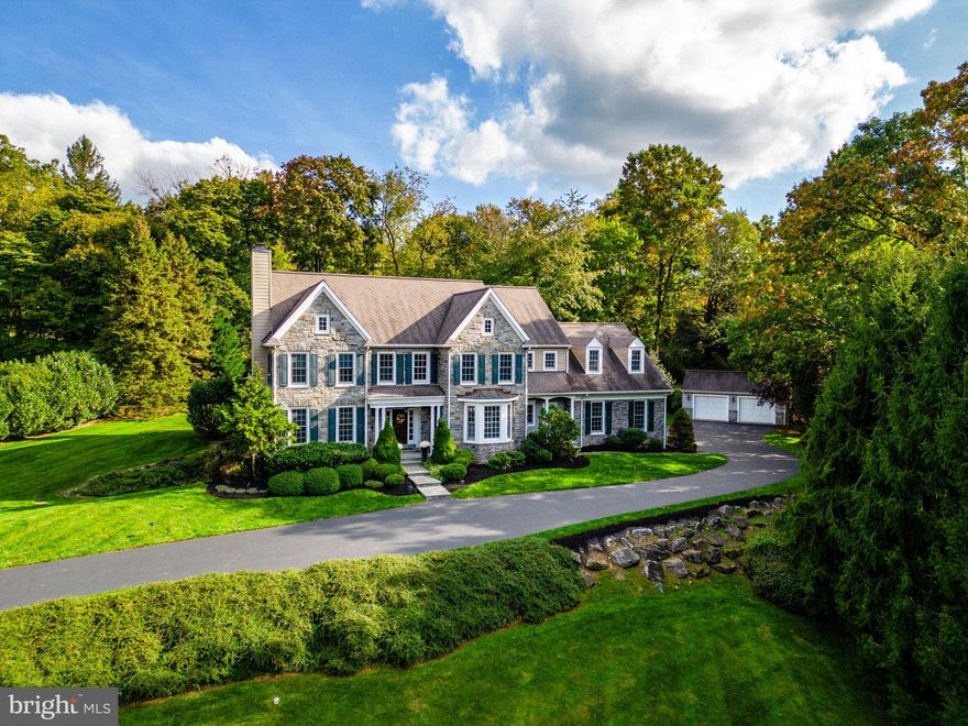 Very rarely does a property come along where you just know, from the moment you pull up, that it's special. Welcome to 815 Brower Road, a truly stunning and elegant 5+ bedroom 4.3 Bath Estate that has been gorgeously updated and meticulously cared for by its owners over the years. Nestled between St. David's Golf Club and McKaig Nature Center, it is perched on a large private 1.2 acre lot in the desirable town of Wayne, with beautiful scenic views from all directions for as far as the eye can see.  Enter your property up a long private drive where you will note that in addition to an oversize 3 car attached garage, a separate 2 car detached garage has been added off to the side -- a rare find. This elegant and inviting home, boasting almost 6300’ft of living space w/ large rooms, tons of windows, and style galore was built  in such a way as to allow you to truly savor the natural beauty of the land from every single room. There are 2 conveniently located entrances - one to mudroom area & backstair and the other a grand formal entrance down the path showcasing the gorgeous gray stone exterior. A huge sun-drenched Foyer with custom grand staircase (and catwalk above) allows for an open view of all the well appointed rooms beyond - a feast for the eyes! It is flanked on one side by a lovely formal Living Room with the first of three Gas Fireplaces, and a dramatic formal Dining Room w/ bay window on the other. There are many high end features to be found including oversized doors and windows with custom plantation shutters, gorgeous solid hardwood flooring (laid on site),  exquisite trim, crown moldings and millwork, upgraded lighting and more. As you walk towards the back of the home you will discover 5 more rooms as well as 2 first floor powder rooms: one a formal guest & the other conveniently located off the mudroom area. Indulge your senses in these enchanting and inviting spaces starting with the generous sized Great Room /Family Room, and moving on to an incredible Chef's Kitchen with all the bells and whistles: ample beautiful custom white cabinetry, large two tier island, 2 dishwashers, desk nook, Butler Pantry, and more. A Fabulous tucked away Office / Library and a sundrenched Morning Room / 4 Seasons Sunroom complete the first floor (full floor plans attached). Most of the home has been freshly painted custom colors and shows like a model! Upstairs you will find 2 more levels: four bedrooms on the 2nd floor including a fabulous Master Suite featuring a lovely sitting room w/ gas fireplace and a large tiled bath w/ twin vanities, soaking tub and oversized shower and 2 walk in closets; a large full hallway bath with double sink and three more spacious bedrooms- one a princess suite w/ adjoining bath. The finishes in this home feature white and neutral soothing palettes - a stylish blank canvas ready for its new owner. You will love the flexibility of the third floor: could be used as a large au pair suite w/ its own bedroom, living room & full bath, or as two additional bedrooms (a 5th and 6th) - customize this space to fit your needs. Please note this entire home has incredible storage and closet space! The massive walk out basement is a dream  -- 9+ foot ceilings, wet bar, billiard area, playroom area, storage area and a fabulous AUTHENTIC WINE CELLAR /TASTING ROOM.  The property outside is so pretty and private and features a large flagstone patio and partial wrought iron fence. Overall, the property is conveniently located: close to so many top area schools like St Katharines, Episcopal, Agnes Irwin (including free bus transport), and more. Close to country clubs, swim clubs, major shopping, local mainline shopping, as well as easy access to major highways for quick trip to downtown Philadelphia! There is so much to love about this exquisite home. Make your appointment today. You will not regret it.