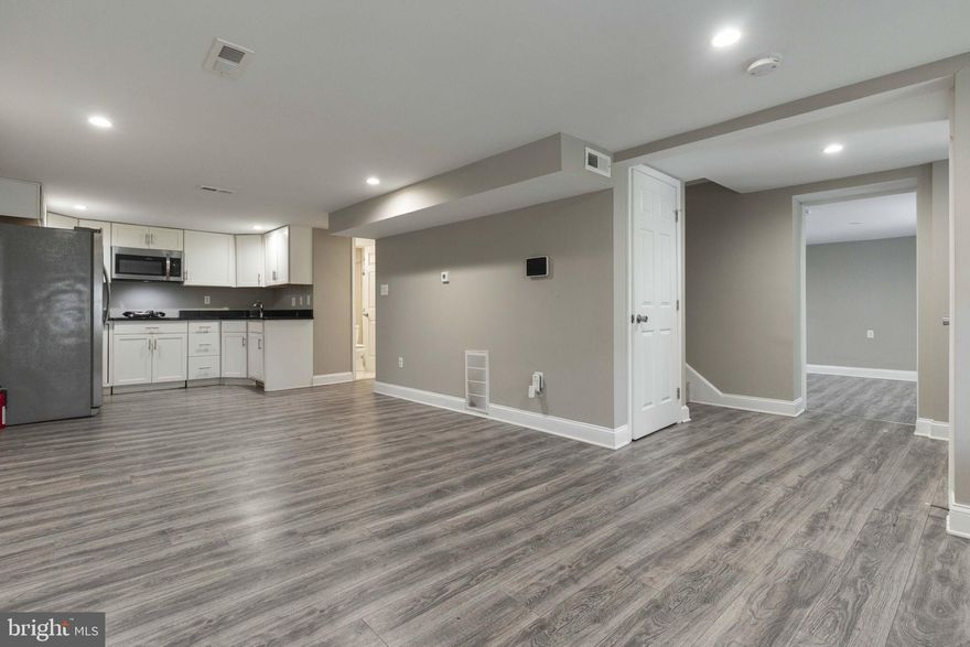 Charming 2-Bedroom, 1-Bathroom  Basement Apartment in Capitol Heights! 

Step inside your home and enjoy the elegant living area, featuring laminate flooring throughout and abundant natural light. The cozy kitchen and dining room combo comes equipped with all stainless-steel appliances, a hotplate, granite countertops, and plenty of cabinet space. 

Relax in the spacious bedrooms, which include recessed lighting and ample closet space. The modern bathroom boasts custom tiled floors, a stylish bath enclosure, flattering above-sink vanity lights, and additional storage space.