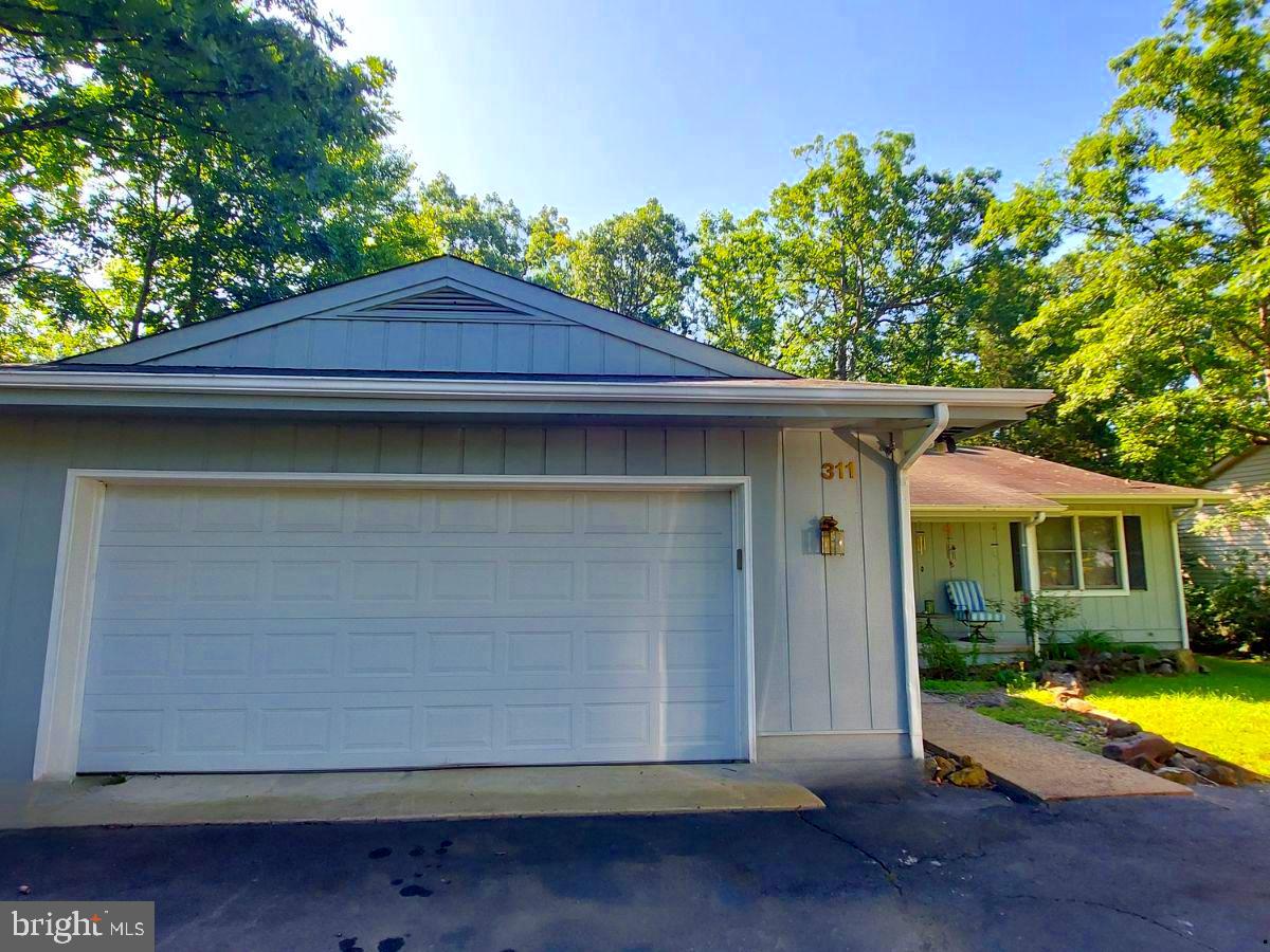 Welcome to your next home in the beautiful, amenity-rich community of Lake of the Woods, Virginia. This well-maintained 3-bedroom, 2-bath residence offers the perfect blend of comfort, convenience, and community charm—all for $2,550 per month.
From the moment you arrive, you’ll notice the inviting curb appeal, complete with a charming covered front porch that’s perfect for enjoying your morning coffee or relaxing in the evenings. Step inside to a spacious and functional split-plan layout, ideal for both everyday living and entertaining. You'll appreciate the expansive primary bedroom. The home also features an attached oversized two-car garage and additional storage space with ample shelving, and it boasts a brand-new roof—giving you peace of mind.
Out back, you’ll love the oversized deck, offering plenty of space for outdoor dining, grilling, or simply enjoying the tranquility of your private backyard. Whether you're hosting friends or enjoying a quiet evening under the stars, this deck is a standout feature.
Located within the private, gated community of Lake of the Woods, you'll have access to an incredible array of amenities, including beaches, pools, a golf course, clubhouse dining, walking trails, and more. It's a wonderful place to enjoy the lake lifestyle while still being conveniently close to shopping, schools, and major commuter routes.
This home is available September 1st so don’t miss your opportunity to experience all that Lake of the Woods has to offer. Possible option to "rent-to-own" is being offered with agreeable terms.