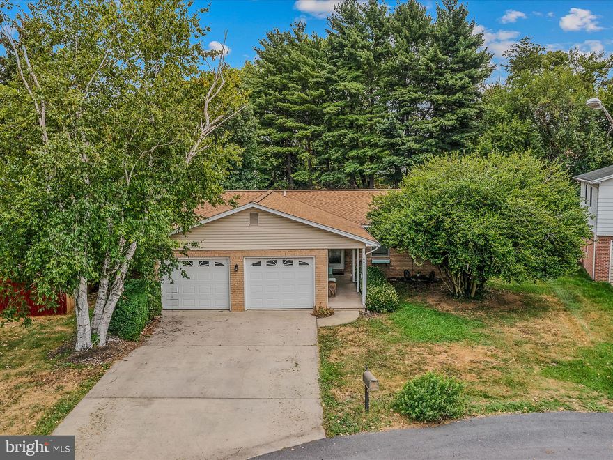Experience one-level living at its best in this well-designed and remodeled rancher-style home. The open floor plan creates a welcoming atmosphere perfect for entertaining. The spacious kitchen boasts upgraded counters and modern appliances, making meal preparation a joy. Step down into the lower level living area with slate flooring, which leads to a large and private rear yard. The formal living room is extra-large and features doors for privacy, offering a perfect space for more intimate gatherings. The separate laundry room, with its own door to the side yard, adds convenience to daily chores. The fully fenced rear yard ensures privacy and comes with a large shed for all your storage needs. Additionally, the property includes a 2-car garage, providing ample space for vehicles and extra storage. This home offers a perfect blend of comfort, functionality, and style, making it a must-see for potential buyers.
