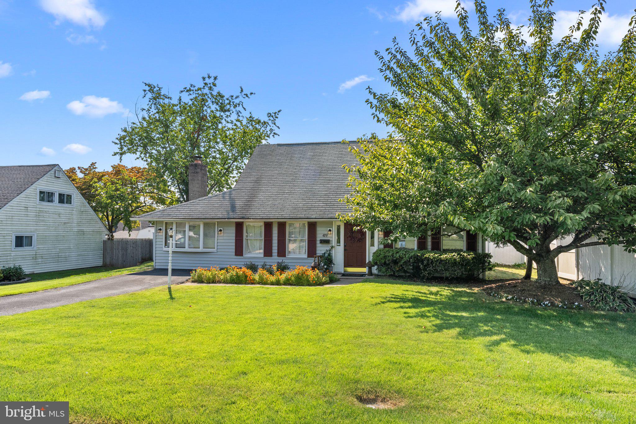Welcome to 49 Towpath Road, Twin Oaks section of Middletown,Levittown. Step into this inviting 3 bedroom Levitt jubilee model that combines charm and and modern convenience.  The first floor layout includes a spacious living room, remodeled  kitchen with breakfast island ,dining area, remodeled bathroom and enlarged primary suite with large closet space and sitting area. Completing the first floor is the family room with fireplace and a large utility/laundry area with pull down attic storage. Enjoy year round relaxation in the heated sunroom, ideal for sipping coffee in the morning or unwinding in the evening. The second floor boasts two ample bedrooms and a remodeled bathroom. Upgrades include the energy efficient heat pump/central air unit. Windows, siding, and doors have been replaced throughout the years of prior ownership. Water heater,kitchen frig,dishwasher ,oven and dryer all less than 3 years old.This lovingly maintained Neshaminy schools beauty will not last. Call today for a private tour.