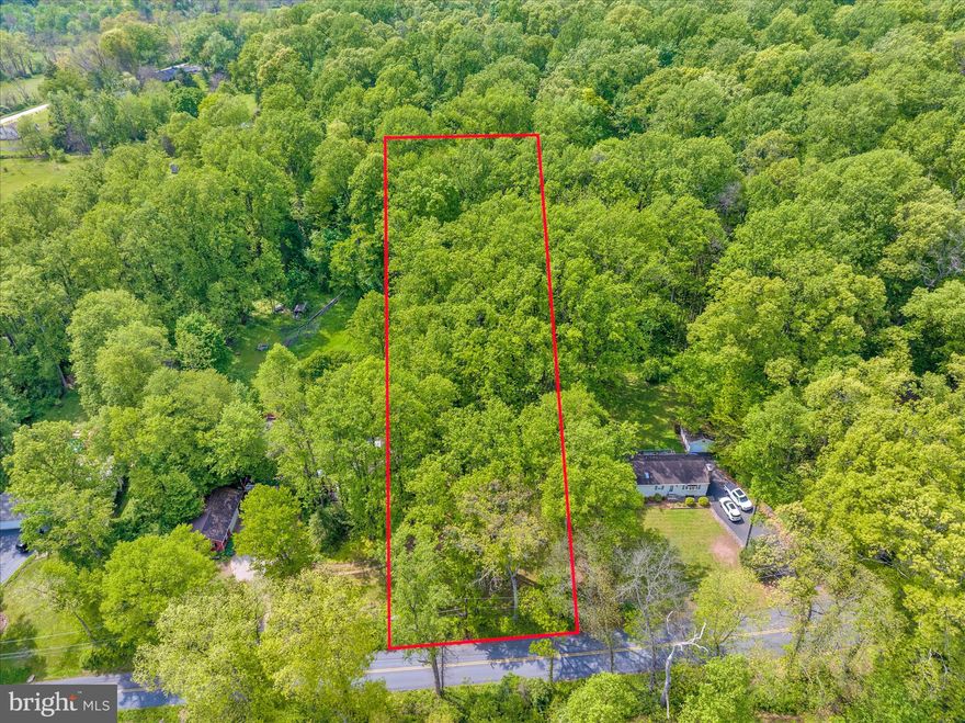 This exceptional 1.3 acre parcel of land presents a unique opportunity for those seeking to build their dream residence in a serene and picturesque setting. Nestled in a tranquil area, this lot is partly wooded and backs to a lush tree line, providing both privacy and a natural backdrop that enhances the overall appeal of the property. The location is strategically positioned to offer a harmonious blend of seclusion and accessibility. Residents will appreciate the proximity to essential amenities, including shopping centers, dining establishments, and recreational facilities, all within a short drive. The partly wooded nature of the lot not only adds to its aesthetic charm but also offers potential for landscaping and outdoor activities. The mature trees provide shade and a natural habitat, creating a serene atmosphere that is perfect for relaxation or entertaining guests. The gentle topography of the land allows for versatile building options, accommodating various architectural styles and preferences. For outdoor enthusiasts, the nearby parks and nature trails offer ample opportunities for hiking, biking, and enjoying the great outdoors. This property is not just a piece of land; it is a canvas for your vision. The combination of size, location, and natural features makes this lot a rare find in today's market. Investing in this land means embracing a lifestyle that values tranquility, and the beauty of nature. With its ideal location and unique features, this property is poised to become a cherished home for years to come. Explore the potential of this remarkable lot and envision the possibilities that await.