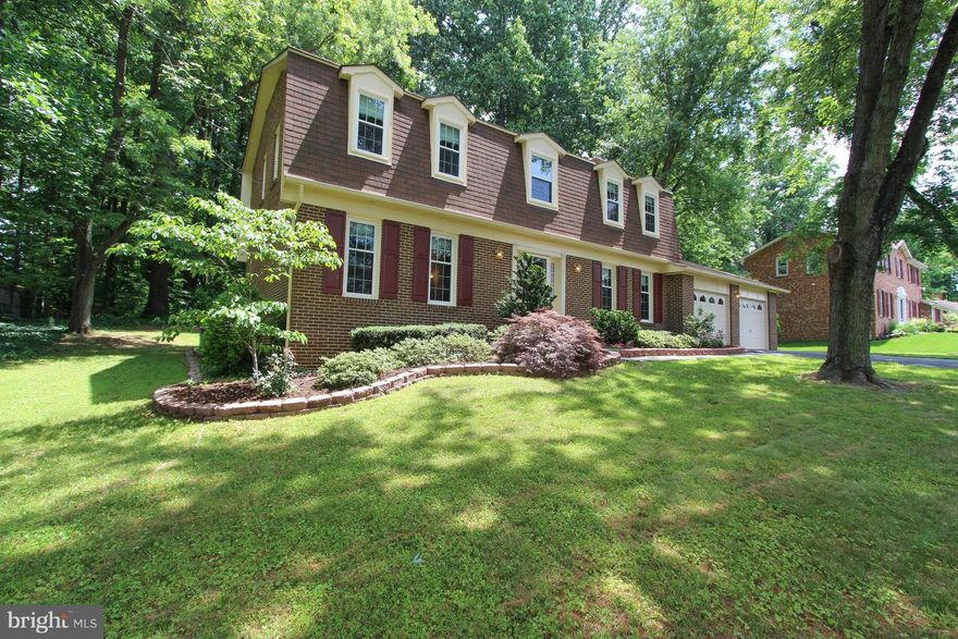 Beautiful all brick Dutch Colonial with updated kitchen and baths! Kitchen features granite counters, double oven and cooktop.   Hardwood floors on the main level.  Master bedroom features walk in closet and fireplace.   Bay window in living room looking out into a nice sized private backyard.  Close to restaurants and shopping in a sought after location.