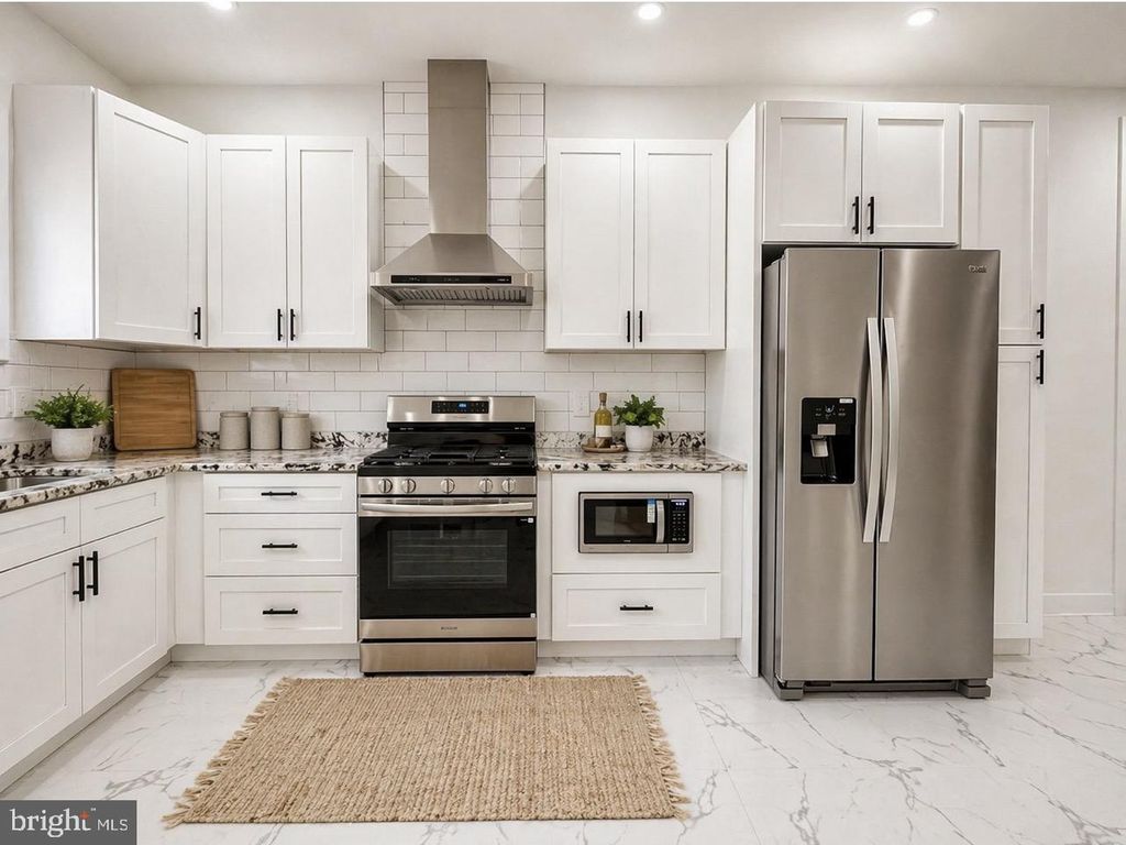 Photo of 3872 Poplar Street, PHILADELPHIA, PA 19104 (MLS # PAPH2612586)