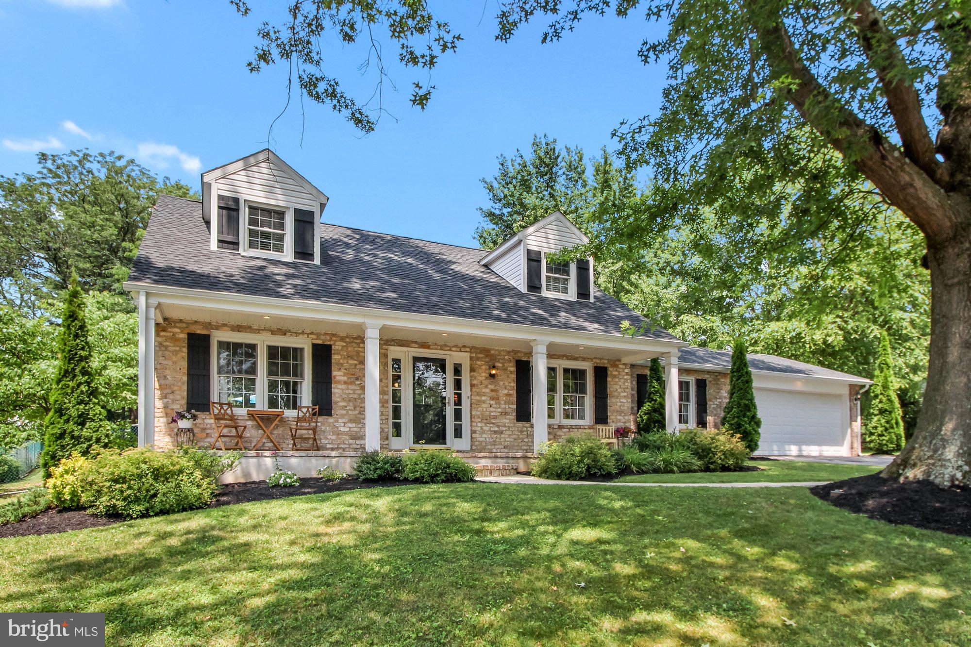 Charming cape nestled under large mature trees in the coveted Southern Farms neighborhood. Beautifully maintained, filled with light and warmth as soon as you enter the front door. The main level has an abundance of space with brand new flooring. A bright and open foyer leads you to the eat-in kitchen with stainless steel appliances and a picturesque window above the sink overlooking the beautiful yard. Relax on the new screened-in porch on the summer nights or imagine cozying up in the family room and have Alexa turn on the brick smart gas fireplace on a cold winter's day. Beamed ceilings and built-in bookcases accentuate the family room space. A spacious living room with crown molding, powder room, and classic dining room round out the main level. Generous bedrooms and a full bath on the upper level including a large primary bedroom with a sitting area. The lower level is partially finished and is the perfect recreation room or great place for your hobbies. Gorgeous outdoor spaces ideal for entertaining plus a two-car attached garage! Farmhouse inspired board and batten shutters and a full covered front porch adorn this brick front home. All the major updates have been done including a new roof, new siding, and new HVAC! Great location close to shopping and restaurants!