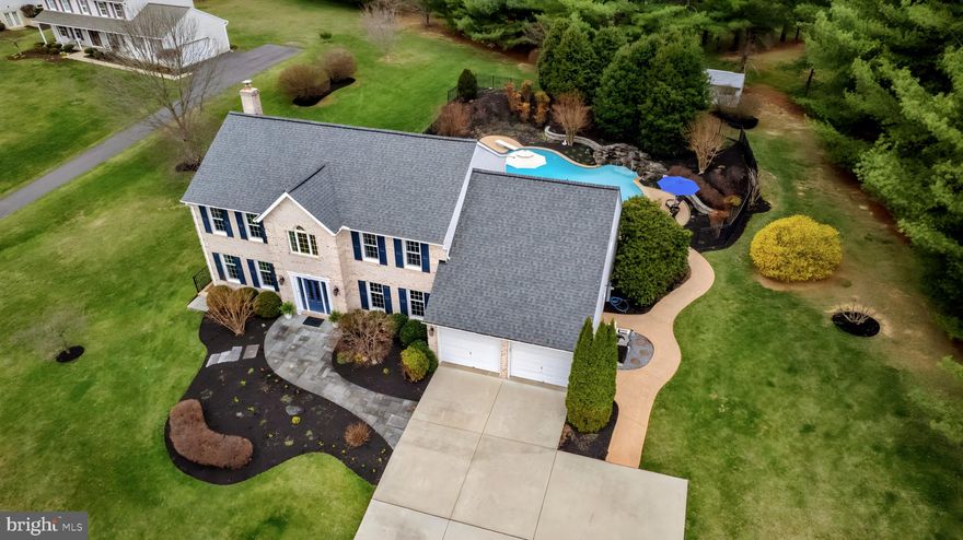 Offers due by Sunday at 6:00pm. You don't want to miss this Impeccably Maintained 4-Bedroom Retreat with Luxurious Backyard Oasis. - Step into a home where every detail has been thoughtfully curated for comfort and style. This meticulously maintained 4-bedroom, 3-bath home blends timeless elegance with modern convenience. The main floor features an expansive family room, anchored by a gorgeous masonry fireplace with a pellet stove insert (2022), creating the perfect atmosphere for cozy nights in. The 2 zone HVAC system (both replaced in 2021) provides efficient comfort all year long. On the first floor, you'll also appreciate the private sunlit office - ideal for remote work or a quiet retreat. There is also a formal living room and dining room that sets the stage for memorable dinner parties and family gatherings. The heart of the home, the gourmet eat-in kitchen, boasts granite countertops, high-end appliances, custom cabinetry, and a spacious dining area that makes every meal a delight. Upstairs, the luxurious primary suite with updated en suite (2018) serves as a private sanctuary, while three additional well-appointed bedrooms provide comfort and privacy for family or guests. Tucked away in a quiet loft of the upper level is a charming private reading nook, an ideal retreat for curling up with your favorite book. The finished basement (updated 2020) offers even more living space—perfect for a home gym, media room, or play area—while still providing ample storage. Outside, your private backyard paradise awaits. Relax in the screened-in porch or take a dip in the sparkling in-ground pool (Resurfaced and new coping in 2018) with its cascading waterfall. Thoughtfully designed landscape lighting accentuates the lush greenery and meticulously manicured gardens, creating a breathtaking setting day or night. Thoughtfully designed and Alexa-controlled, this smart home features Ecobee thermostats and integrated controls for the heated saltwater pool, waterfall pumps, lighting, and outdoor sound system, bringing effortless comfort to everyday living.
This home is more than a place to live—it’s a place to love. Don’t miss the chance to make it yours!