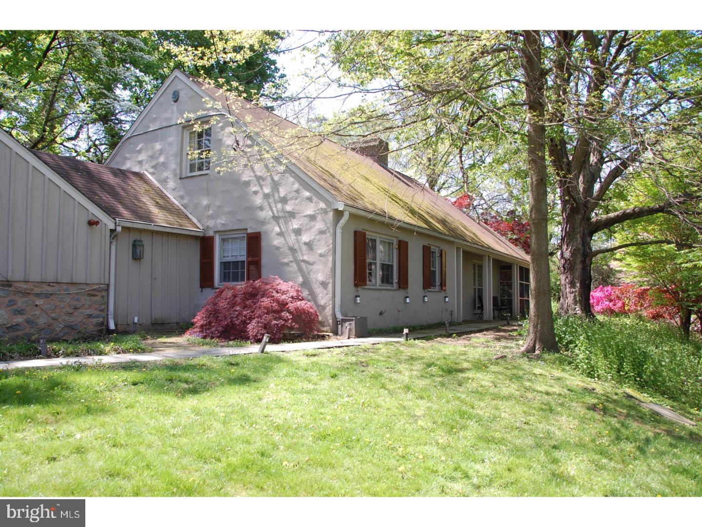 This 1.5 story Cape Style home is set back from the road on a secluded 1.13 acre flag lot with mature growth and manicured lawn and gardens. The exterior features a flagstone front porch, as well as a flagstone back patio with garden and fountain. The first floor boasts hardwood floors, a Master Bedroom, 2 brick wood-burning fireplaces, and an amply sized screened in tiled porch. The Kitchen comes fully equipped with a full range, refrigerator, stainless steel sink, and tons of counter space. Just off the Kitchen is a charming Breakfast Room with a doorway and bay window looking onto the patio. Other features include 2 more bedrooms, a large unfinished room on the second floor, and a two car garage.