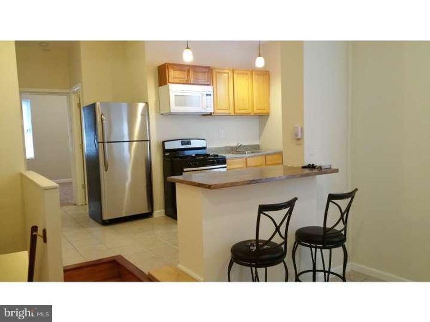 Just 5 blocks from TU. The Quadruplex is fully renovated in 2014. Center air, granite countertops, stainless steel appliances, hardwood flooring, separate gas and electric meters. Don't miss out this incredible opportunity to own this great turn key investment property! 1st Fl is a 2 bedrooms apartment rented for $1,000/month. 2nd Fl front is a one bedroom apartment currently rented $700/ month. 2nd FL Rear is a one bedroom apartment rented for $600/month, month to month. Tenant has been here for more than 6 years. Landlord never increase the rent.  3rd Fl is a 3 bedrooms apartment rented for $1000/month.