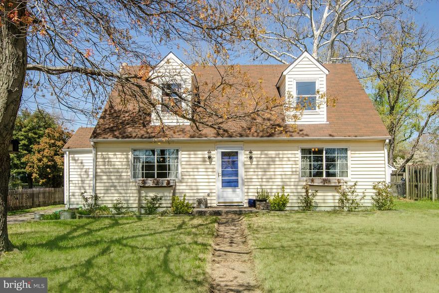 Gorgeous Cape Cod perfectly located in sought after water oriented community.  Extensive renovations to 90% of the home to include both bathrooms. Designer tile highlight the beautiful dining room and main floor master (huge w/in closet). Screened porch is ready for your summer crab feasts. Fully fenced backyard and an oversized 2 car garage that all of your friends will envy. Priced to sell!!