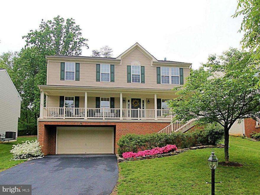 Open floor plan, & move in ready.  This home boasts over 3400 finished sq ft 4 bedrooms, 3 1/2 baths, finished basement, new carpet and paint throughout the main levels.  Fenced rear yard  backs to a wooded area   Finished basement with bath can be used as 5th bedroom. 20X34 garage, can  fit 4 cars!  Walking distance to all 3 public schools, dining, downtown shops, parks, and groceries.