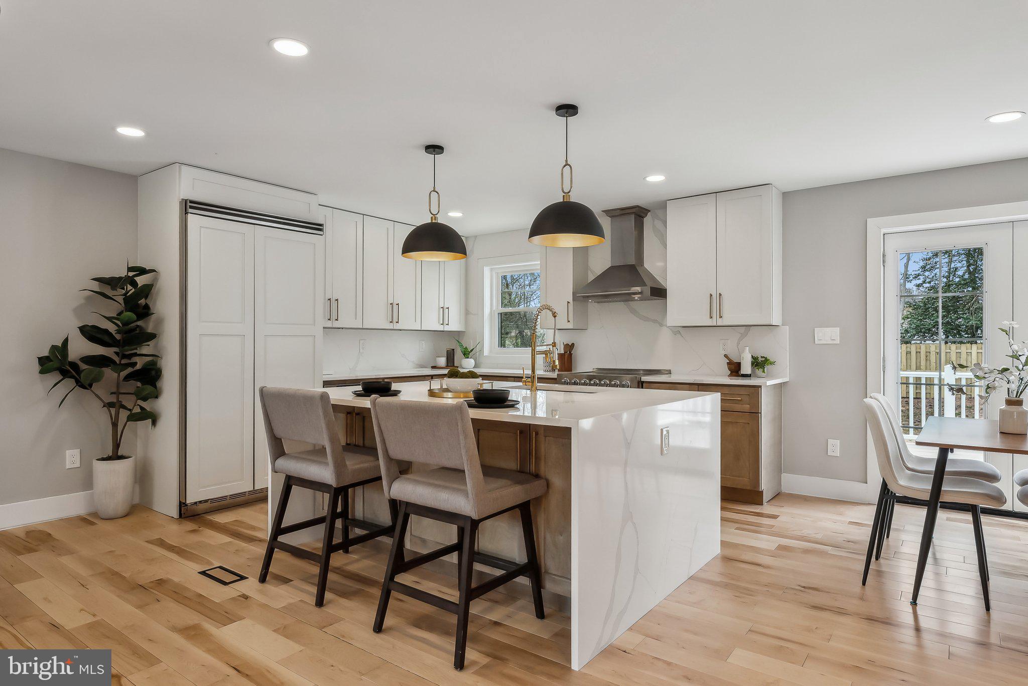 This stunning, fully renovated split-level home in Great Falls, VA, offers modern luxury and exceptional craftsmanship. Featuring a grand circular driveway with a fountain, the home welcomes you with beautiful LVP floors and an open, light-filled layout. The gourmet kitchen boasts high-end appliances, custom cabinetry, and sleek countertops, perfect for cooking and entertaining.
The bathrooms are beautifully designed with spa-like finishes, creating a serene retreat. Set on a half-acre lot, the expansive backyard is perfect for outdoor living.
No detail has been overlooked in this meticulously updated home, located in a peaceful neighborhood with easy access to shopping, dining, and top schools. Don’t miss the chance to make this exquisite property yours—schedule a tour today!