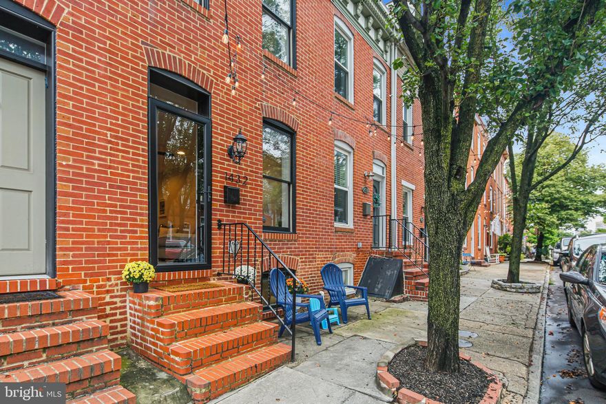 Federal Hill Stunner! Located on one of the finest streets in the City, this home offers tons of walkability to area venues, sports stadiums, Inner Harbor, local parks, downtown district & much more! Easy access to I95 & public transportation. This home truly 'HAS IT ALL' !  A Van Allen Homes Custom renovation (2019) with a CHAP Tax Credit with 6 1/2 years remaining! (Approx. $17k in tax savings).  Enjoy the convenience of a rear Parking Pad, ample street parking, Roof Deck & high end finishes throughout.  The versatile floor plan encompasses over1,700 SQ FT of finished living space spread over 3 levels with light filled rooms & tons of character & charm.  A neutral color palette coupled with tasteful decor provides a crisp  & clean look. Access the Roof Deck from the 2nd level hallway.. another place for relaxation, morning coffee or entertaining. The partially finished lower level offers a 3rd bedroom/office, full bath, laundry & storage. Surround sound system throughout the home allows you to create an ambiance for every occasion.