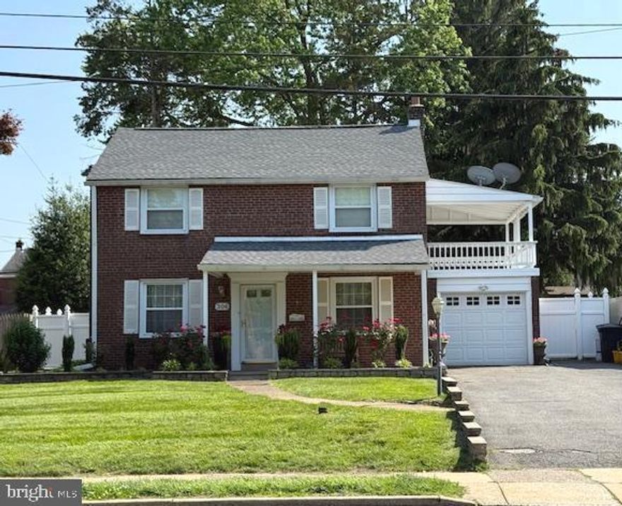 NEWEST PRICE,  IDEAL OPPORTUNITY. Handsome 3-Bedroom 2-Bath Brick Colonial with versatile  Family Room addition spanning the whole rear of the home! This two-story property offers a wonderful sense of openness and natural light as you enter from the front porch.  Inviting  first floor boasts gleaming hardwood oak flooring throughout and a tasteful  neutral palette.   Generous Living Room has electric Fireplace focal point, ceiling fan, recessed lighting, and custom oak staircase tucked at rear wall for uninterrupted floor space and flow.   Living Room opens into a handsome Family Room also with recessed lighting, table space for dining or games and exit to patio/yard.  Windows galore overlooking green yard space for a vibrant indoor/outdoor connection.   Formal Dining Room  features chair rail accent and corner windows.  Bright Kitchen sparkles with white cabinetry and matching appliances, tasteful neutral design, newly installed Whirlpool dishwasher, electric cooking and handy Breakfast Bar with two stools.  Comfortable adjacent Family Eat-in Area features dramatic arch glass transom window,  vaulted ceiling,  elegant chandelier and side exit to brick patio and  big yard.  Three nice Bedrooms and updated porcelain-tiled Bath with tub/shower and vanity on second floor.  One Bedroom features an exit to a covered porch  over the Garage.  From the kitchen, a crafted oak staircase leads to a  super-size lower level Recreation Room with ceramic tile flooring, recessed lighting  and chair rail.  Perfect for office space, exercise or play room, games and guests!  Practical 9x9 Laundry Room with newer GE washer and dryer (6/25) plus dramatic updated Full Bath with floor-to-ceiling porcelain tiling, large glass-enclosed shower.   Two nearby double-louvered door closets with handy shelving.   Generous level rear yard is fenced with playground area, plenty of space for activities, gardening and pets plus two brick patio areas ideal for cookouts and conversation.  Central Air plus ceiling fans throughout.  Oil heat. One-car adjacent garage with interior access, private driveway for four vehicles.  Ideal Springfield  location near schools, shopping, transportation and recreation.