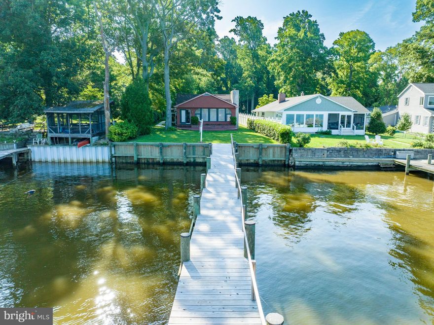 Breathtaking, panoramic views of the Bush River! Here is your chance to enjoy waterfront living! Open floor plan of the living room, dining room and kitchen and a wall of windows allow for stunning views of the river. The home offers 3 Bedrooms, 1 Bath and a den/BR4. Convenient laundry/mud room off the kitchen. The 2-car garage has been converted to living space bringing the square footage of the home to over 2200 sq ft. Waterfront deck off the living room will become a favorite spot to relax and enjoy stunning river views. Great parking-paved driveway, carport, and parking pad. Bulkhead and 150' pier replaced in 2020. Boat lift conveys as is. 30 Yr Roof 2023. Boiler 2016.  Updated electric. Well pump 2017. Peace of mind with Home Warranty and Basement waterproofing with transferable warranty. Don’t miss your chance to make this waterfront paradise your own! Property is being sold AS IS.