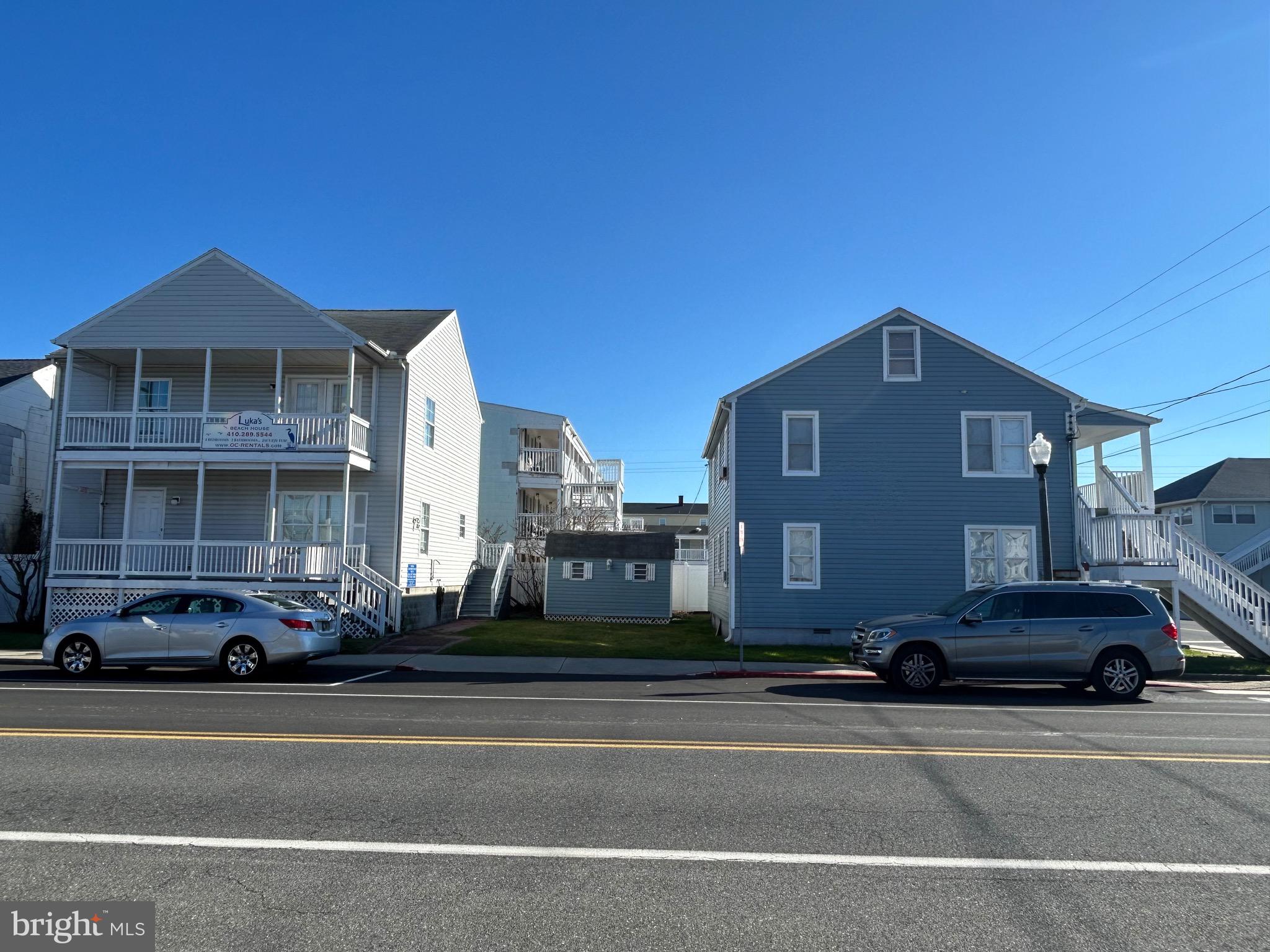 "Lukas Apartments" is located on Saint Louis and 8th Street in downtown Ocean City. Just a block to the bay and a few blocks to the ocean. Views of both bay and ocean from balcony. The property consists of 2 separate buildings. One building is a 4 bedroom 2 bath house. The other building a separate first and second floor unit with 3 bedrooms and 2 baths each. The property has a total of 10 bedrooms and 6 full baths. Many new updates. Sold fully furnished. Winterized. All 3 units have 2 entrances, which gives the option of splitting the 3 current units into 3 additional smaller units.