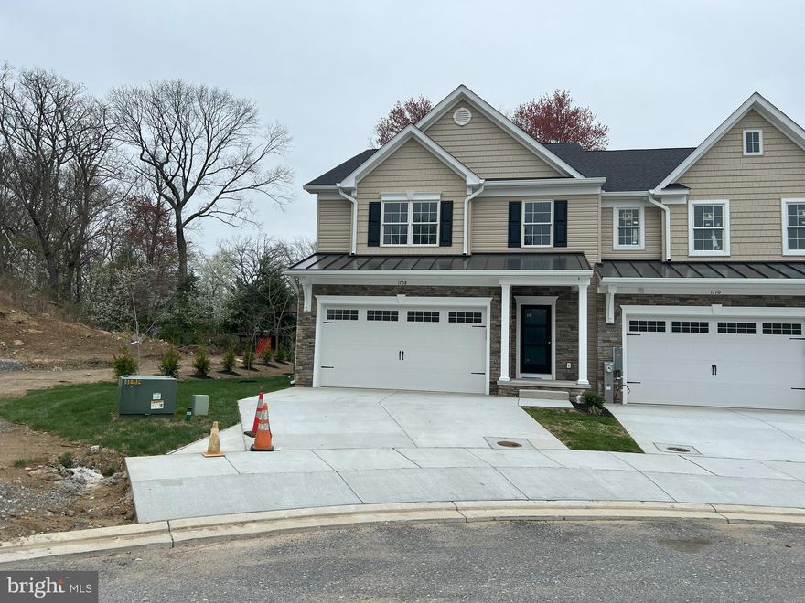 Open House Saturday 12-3 pm. Stop in at 1716 to see finished home. Eldersburg's new Doroly Gardens 55 & older community will have 28 units when completed. This custom home is built with quality materials inside & out. Exterior features include cultured stone, vinyl siding & cedar look vinyl shake accents. This End Unit is close to completion, just needs flooring & cabinetry installed. Featuring Anderson double hung tilt windows & sliding door. The first floor includes a foyer with coat closet, half bath with granite counters, first floor laundry room with ceramic floor. Spacious kitchen will include: island with breakfast bar, soft close cabinetry w/roll out trays, trash drawer, granite counters tile backsplash, under cabinet LED lights, ss gas range, plus a under counter wall oven, dishwasher, microwave, garbage disposal. First floor owners suite with tray ceiling & ceiling fan, ensuite full bath with large ceramic tile, taller vanities, double sinks, granite counters large shower, linen closet & walk-in closet (floor in closet will be carpeted).  Great room with vaulted ceiling, ceiling fan, natural gas fireplace with mantle and marble surround with sliding door to covered rear patio. Take the stairs to second floor with oak stair treads, white risers & oak railings. Second floor includes a spacious loft with hardwood floors & ceiling fan, linen closet, 2 spacious BR's with walk-in closets, ceiling fan & carpeted floors. Second floor also includes a full bath with double vanities, granite counters, plus tub/shower & commode in a separated room all with over-sized ceramic tile.  Located off the loft is a huge mechanical storage area. The basement is finished and includes a wet bar, full bath,  plus an egress window & single door basement exit to yard. The home also includes a two car garage that is insulated, drywalled, painted & garage door opener. HVAC is two zone heat pump with natural gas back up heat & CAC, ceiling fans in great rm, BR's & loft area. Monthly condo fee $225 includes lawn care, trash service, road maintenance, street lights, snow removal & exterior mulching. There are 2 end units and two interior unit available for sale, 1710, 1712, 1714 & 1716  Botanical Ct. BUILDER OFFERING $5,000 TOWARDS BUYERS CLOSING COSTS WITH USE OF BUILDER RECOMMENDED LENDER ONLY, WITH FULL PRICE CONTRACT!