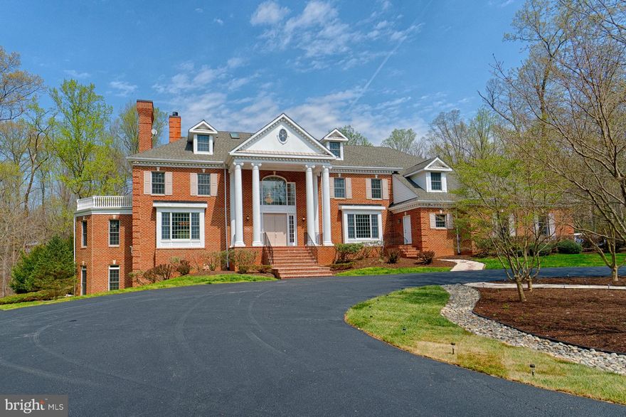 Gorgeous Home on 5 acres, have to see to comprehend. Huge natural rock swimming pool with water falls and slide,Jacuzzi, baseball diamond and tennis court. Huge fully finished walkout basement with Studio and Gym. Main floor 2 living rooms with breath taking views and gourmet kitchen. Upper 1 Master BDR with fireplace, walkout deck and whirlpool bath. Upper 2 2nd Master BDR with 4 skylights.