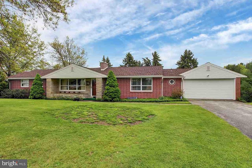 Well-cared-for home on 9+ acres that includes a barn & stream.  Many  improvements such as new septic, newer roof, electric, GAR door & windows, etc.  1st flr has 3BR, 1.5BA, den, LAU, KIT, LR w/ FP & DR w/ buffet & corner cabinet.  BSMT has large FR w/ FP, KIT, storage & workshop.  Lots of potential in this beautiful piece of property.  Ideal country location, but just minutes from conveniences.