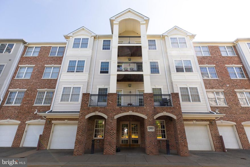 Don’t miss the opportunity to view this wonderful 2 bedroom, 2 bath condo in the sought after 55+ community at Central Parke at Lowes Island.  New paint throughout.  New appliances in the kitchen. The unit backs to secluded woods and lovely vistas.   Upon entering, you see gleaming hardwood floors and an open floor plan.  There are chair rails and crown molding throughout. Large living room boasts a gas fireplace and sliding door to an inviting balcony with a view of the woods.  There is a large separate dining room, perfect for elegant entertaining or cozy family dining.  The owner’s suite has a lovely sitting room that is the perfect space for reading/relaxing and leads out to the balcony.  The guest bedroom is large with a separate bath. Separate laundry room with full size washer and dryer. An incredible opportunity to enjoy a fabulous lifestyle. Enjoy the community amenities: outdoor pool, library and party/meeting room, fitness center and a club house with daily activities.  Residents have full access to the amenities of the Cascades community: pools, tennis courts, golf courses (public & private), Potomac River and a boat launch. Great location near shopping and commuter routes such as Fairfax County Parkway, Route 28, Route 7 and Reston Silver Line Metro.