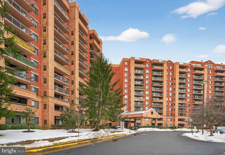 MOTIVATED SELLER.  Outstanding, modern, spacious unit on the QUIET SIDE of the building.  This unit is light-filled with loads of windows and a big sliding door leading to a spacious balcony.  Kitchen includes maple cabinets, granite counters, and stainless appliances.  Washer / dryer IN UNIT.  For privacy, the two bedrooms are on opposite sides of the unit, each with their own bath and walk-in closet.  TWO ASSIGNED parking spaces, among the closest to the bldg (most units only have 1).  Amenity rich building with tennis and pool (both enclosed with bubbles for winter use).  Spacious grounds with fitness trail plus fitness center in building.  Fantastic location -- walking distance to Metro, but also with free Metro shuttle bus.  Close proximity to Tysons Corner, Beltway, and I-66.  This unit shows well and is an outstanding value.