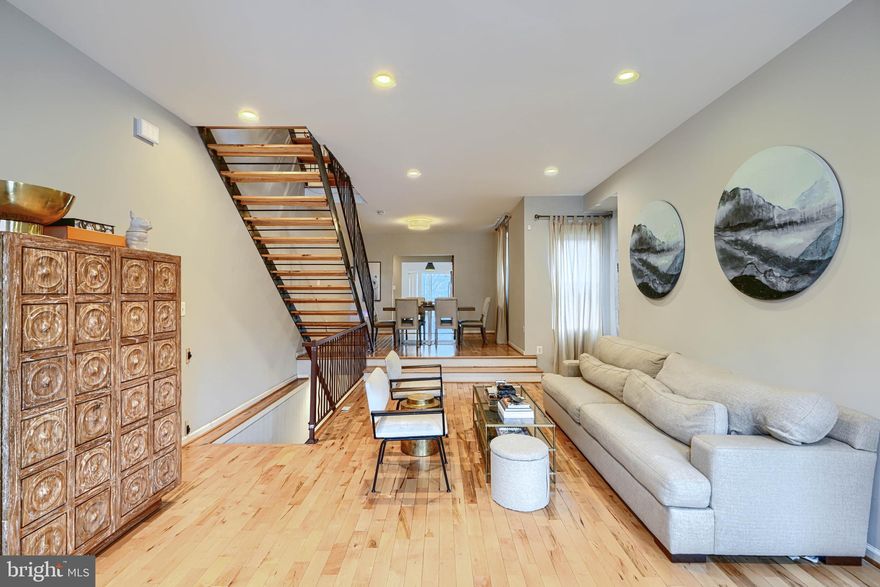 Welcome to 1711 Hollins Street, a stunning and spacious townhouse offering over 3,000 square feet of stylish, comfortable living in Baltimore's historic Union Square neighborhood. 

THIS HOME QUALIFIES FOR THE LIVE NEAR YOUR WORK GRANT THROUGH UNIVERSITY OF MARYLAND BALTIMORE! UMB will contribute $16,000 per eligible participant. In addition, participants will be eligible to receive a matching grant of up to $2,500 from the Baltimore City Live Near Your Work Program. 

Located in one of Baltimore's Healthy Neighborhoods so buyers can qualify for a healthy neighborhoods loan!

 Home buyers may also be eligible for other grants and down payment assistance programs like the FHLB grant up to $20,000! 

The home is move in ready and was completely renovated in 2015. 

The main level is bright and open with maple floors, floating stairs, recessed lighting, a spacious living room, dining area, wet bar, half bath, and modern kitchen. Sliding doors from the kitchen lead to a large fenced in rear yard and a detached rear garage! 

The second level has two spacious bedrooms with ensuite bathrooms, a second living area, and a conveniently located laundry closet. On the third level, you will find a third spacious bedroom with an ensuite bathroom.  

There is even more finished space and storage space in the basement.

This home's proximity to I-95, I-295, and the Baltimore MARC station makes it an ideal location for DC commuters! 

Located in one of Baltimore's Healthy Neighborhoods so buyers can qualify for a healthy neighborhoods loan! Home buyers may also be eligible for other grants and down payment assistance programs like the FHLB grant up to $20,000! 

A Local Historic District and  National Register Historic District spanning just five blocks east to west and three blocks north to south, the neighborhood is a community of about 550 houses in Southwest Baltimore and anchored by the 2.5-acre Union Square Park. 

Union Square community events include the annual Cookie Tour of Historic Homes, the summer Sunday Sounds in the Park concerts, The Charm City Circus (a family friendly aerial arts festival), the SoWeBo Landmark 5k race,  and regular salon concerts and art events by the Union Square Soirée! There is also a very active Union Square Families Group that hosts regular meetups and events for families.

The neighborhood is very walkable and close to several dining options including the Hollins Market, Rooted Rotisserie, Neopol Savory Smokery, and Zella's Pizzeria.